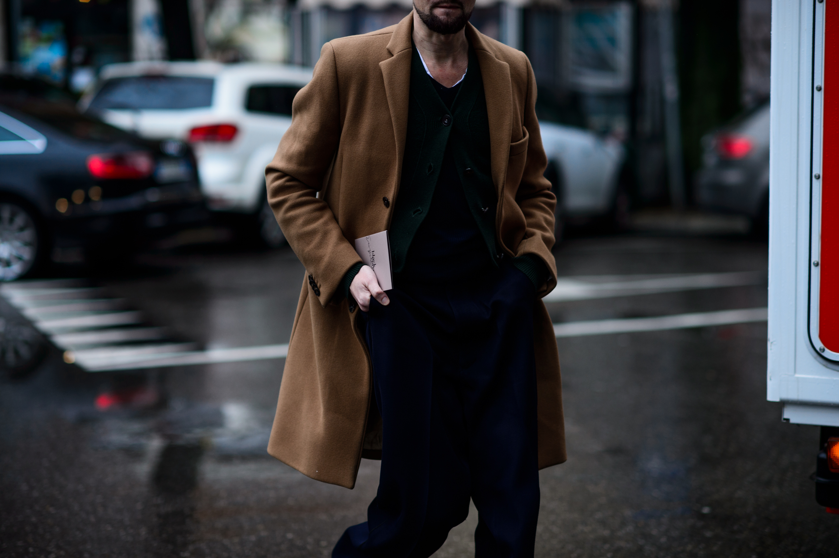 Man wearing beige coat