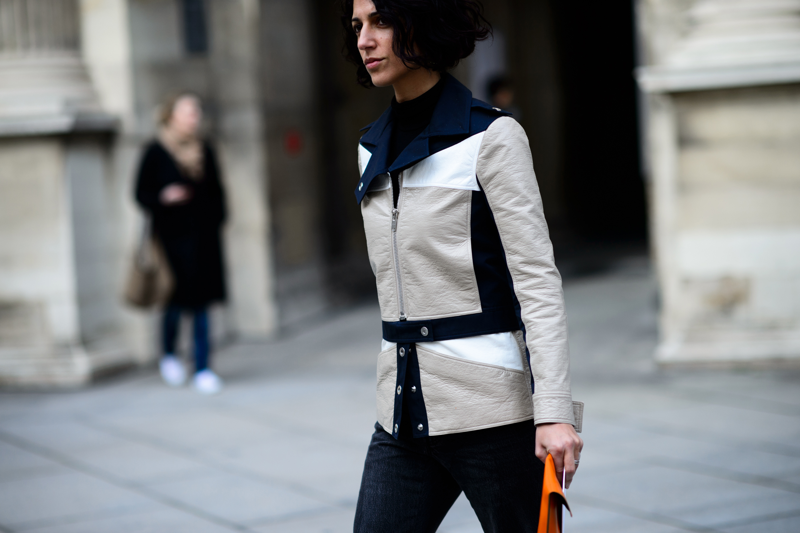 Woman in coloured leather jacket