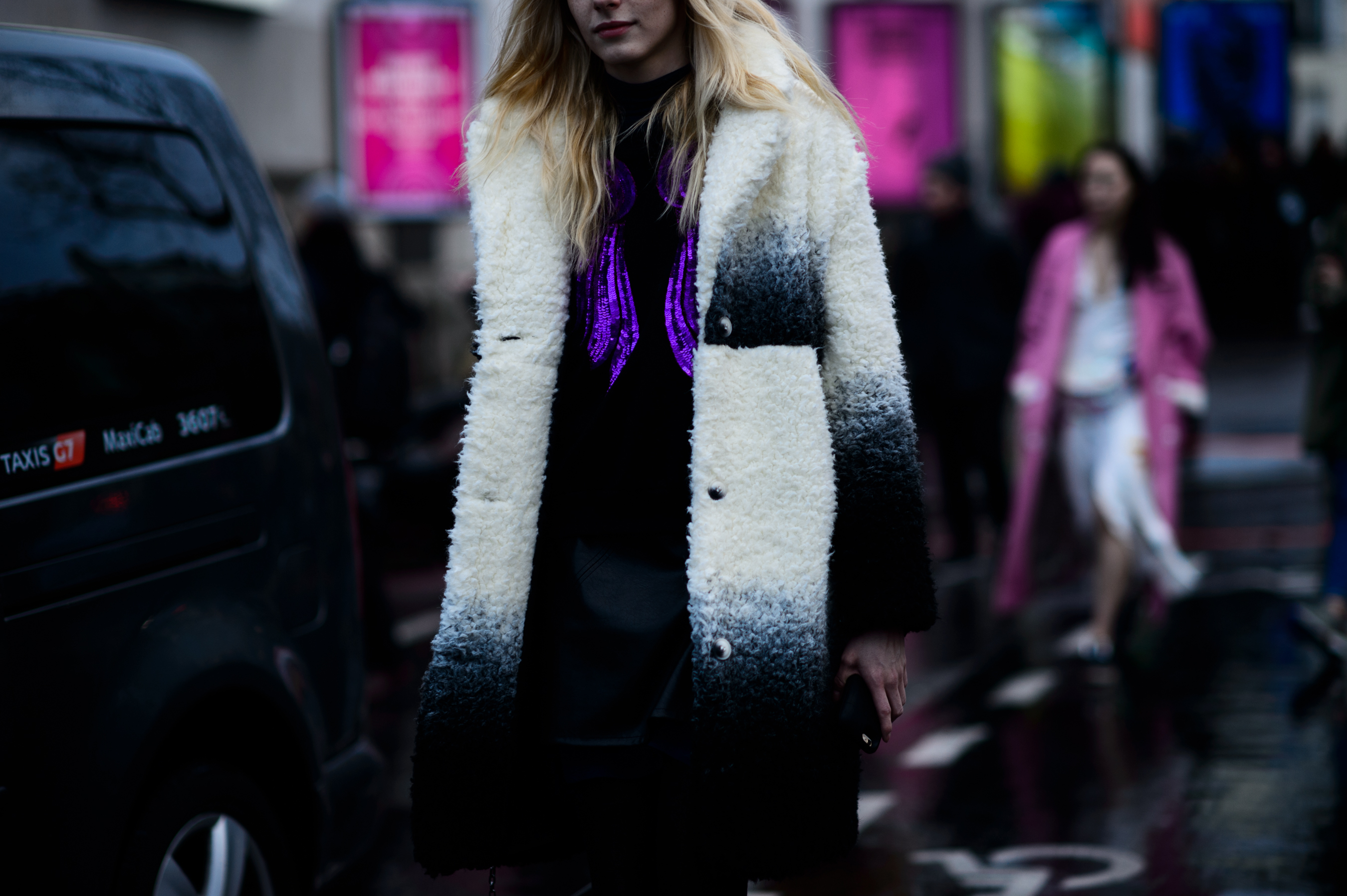Girl wearing white coat