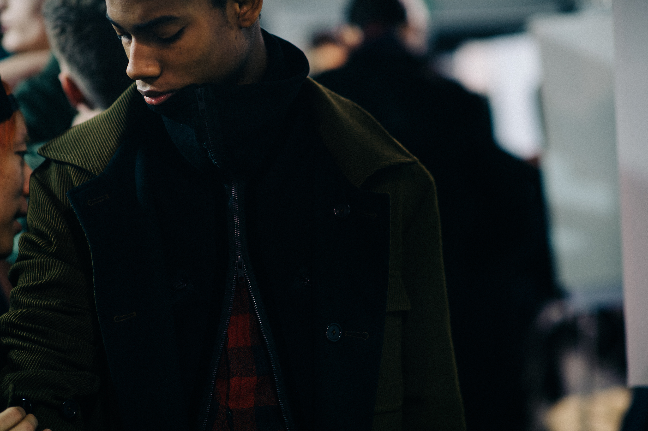 Male model wearing green jacket