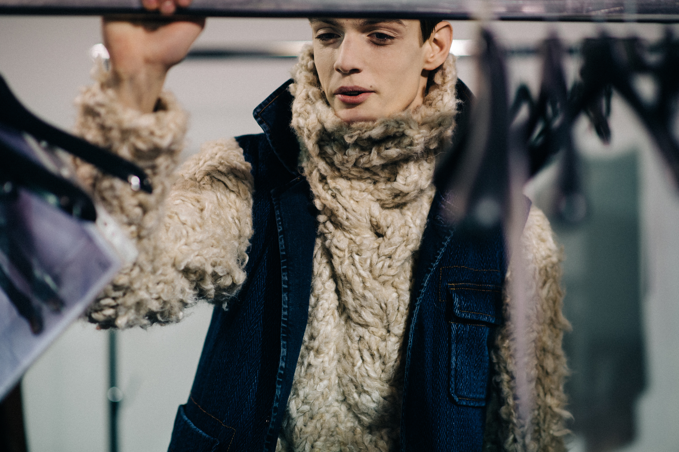 Male model wearing oversized knitwear