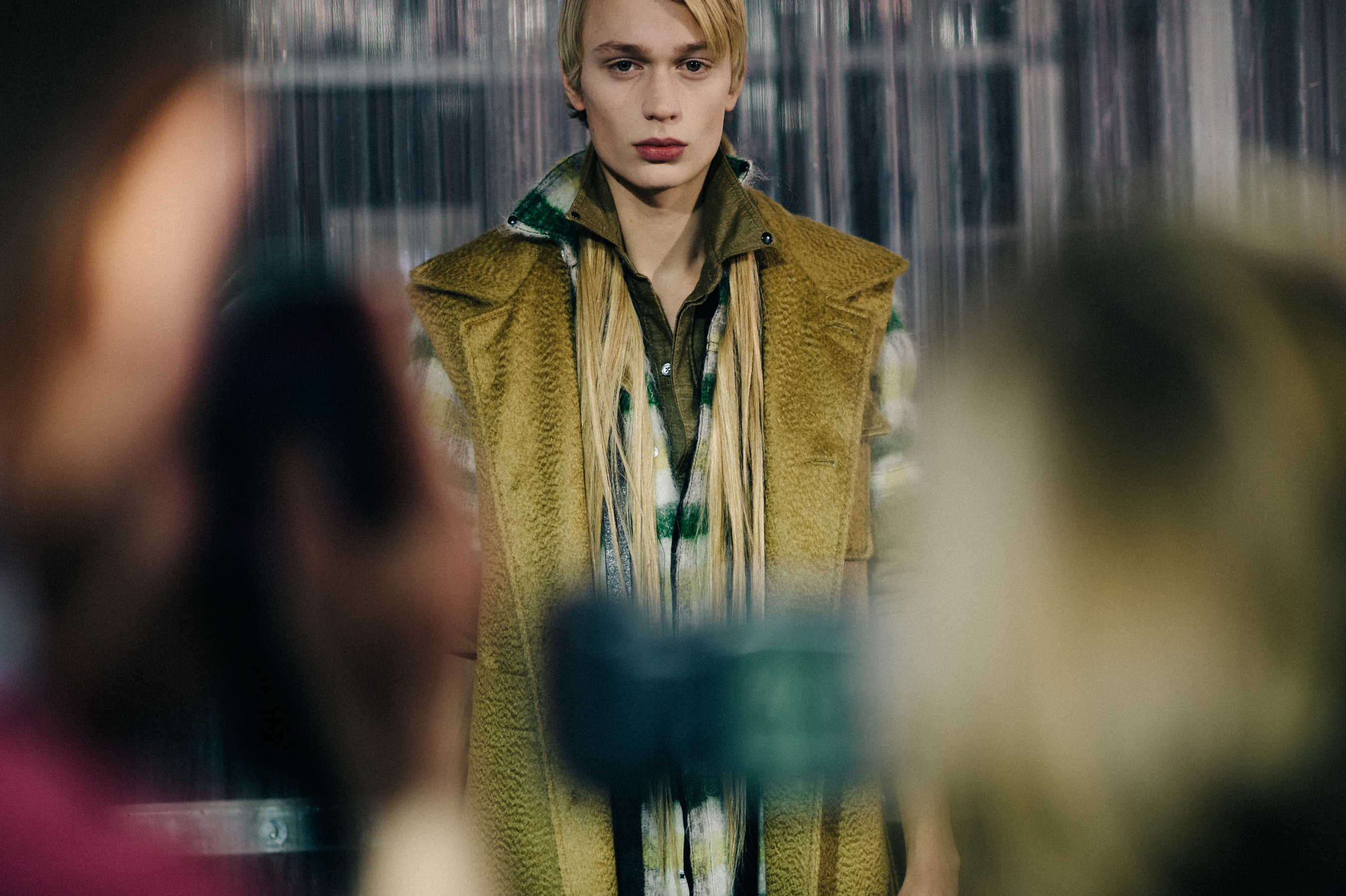 Male model wearing yellow vest