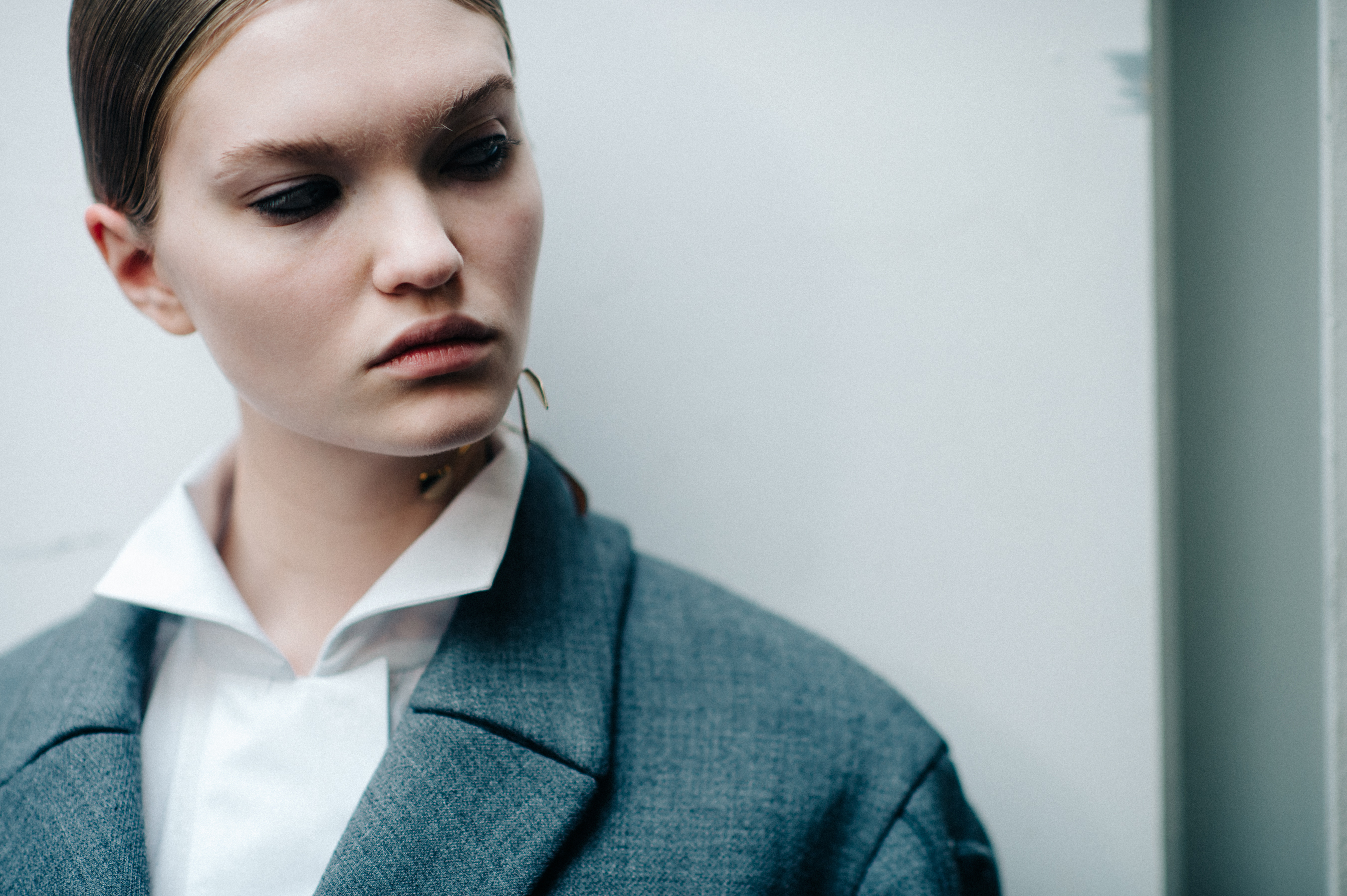 Model wearing white shirt and blazer