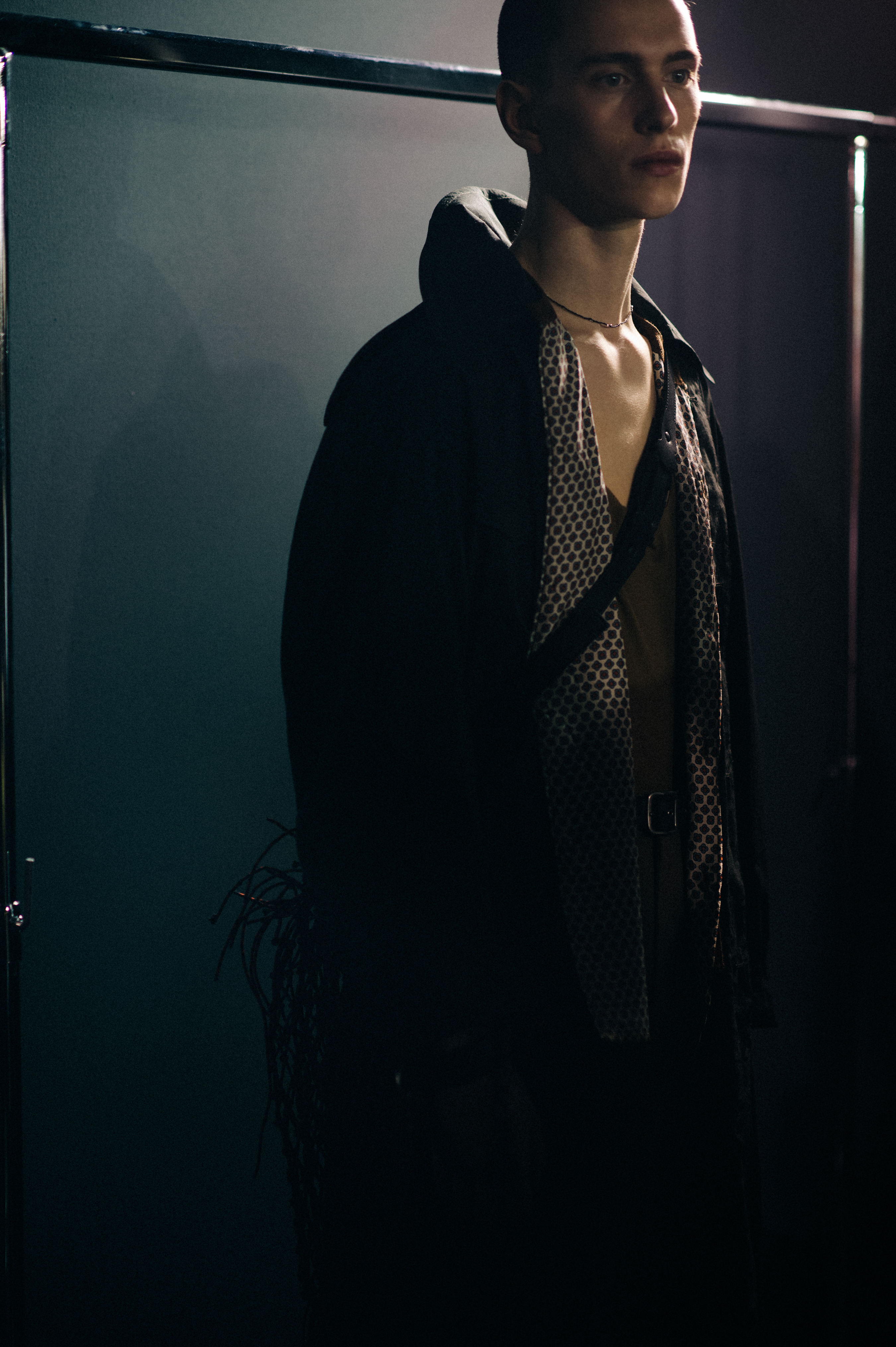 Male model wearing brown outfit