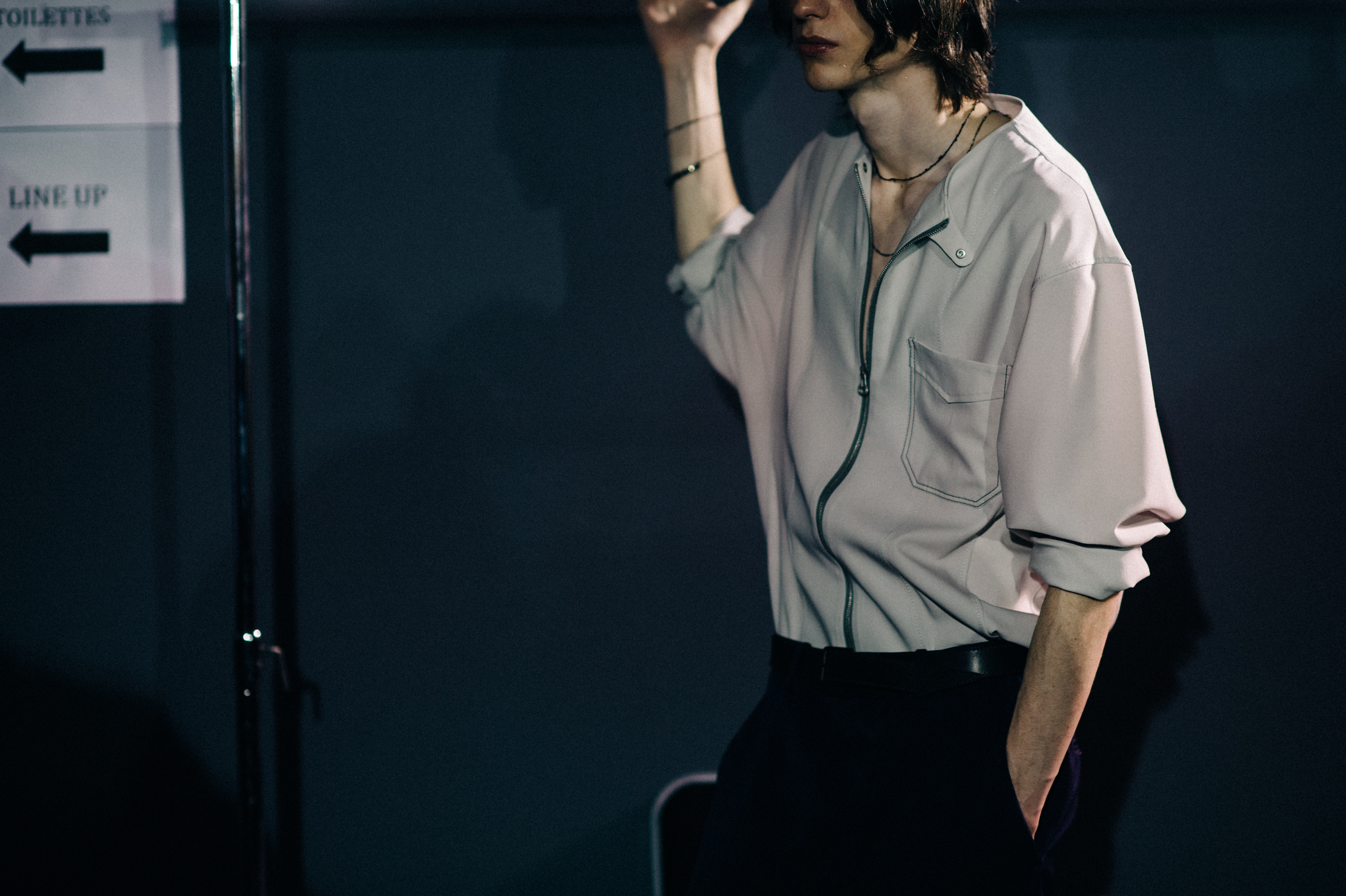 Male model wearing off white shirt