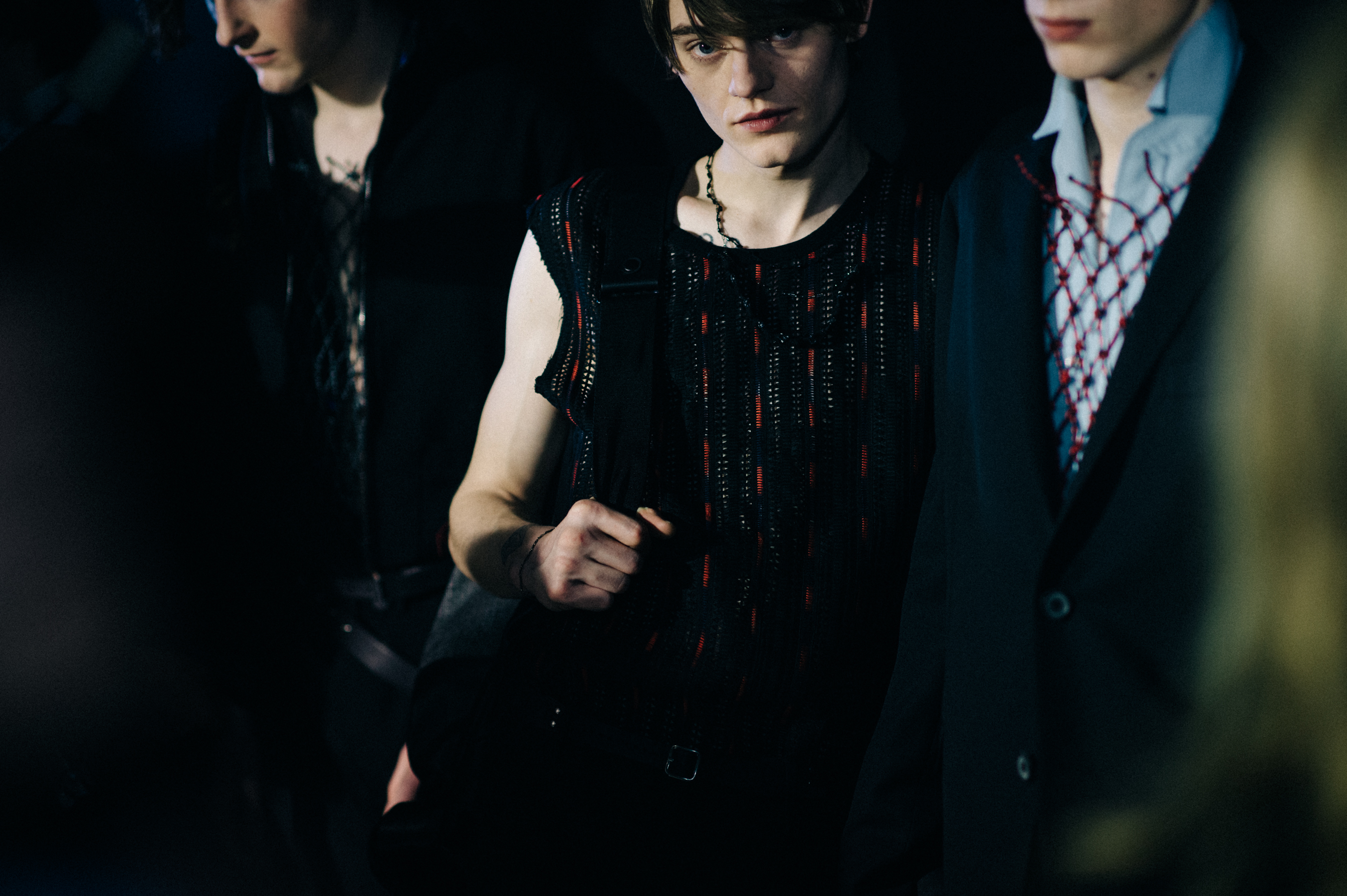 Group of male model before show