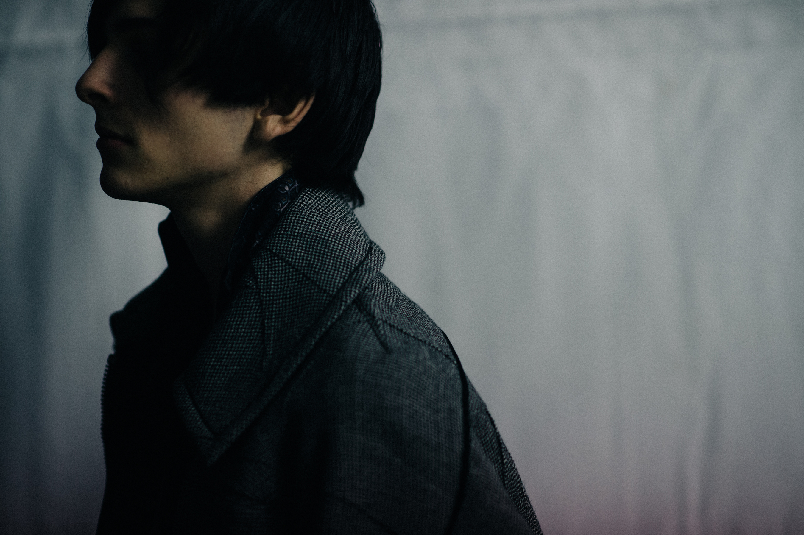Male model wearing gray coat