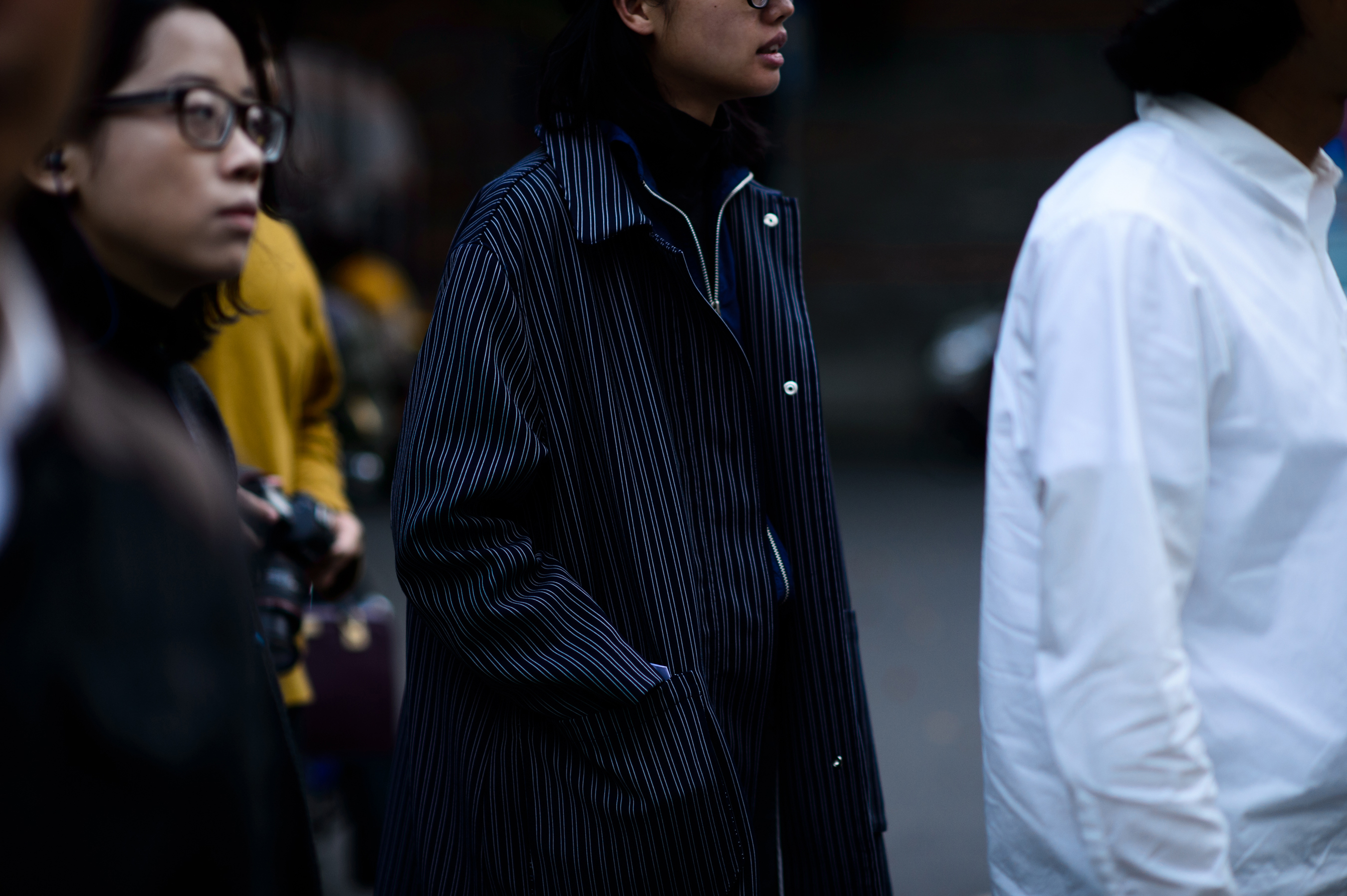 Man wearing striped oversized jacket