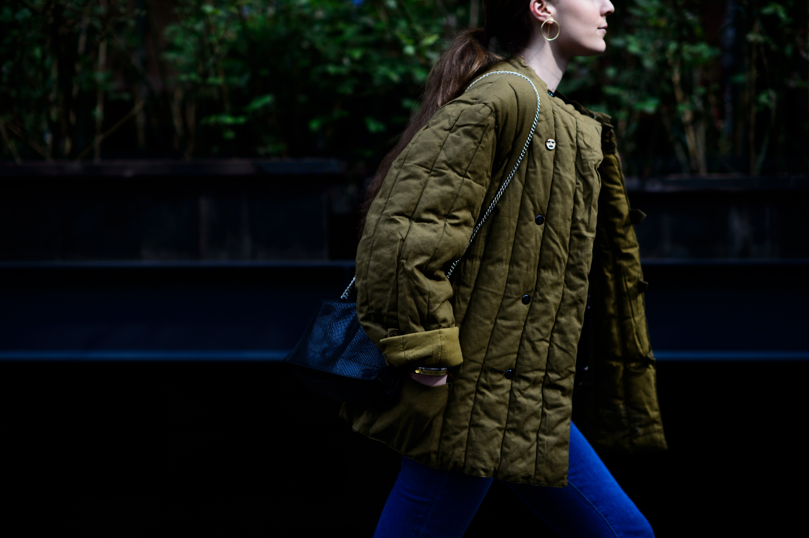 Girl wearing stitched jacket
