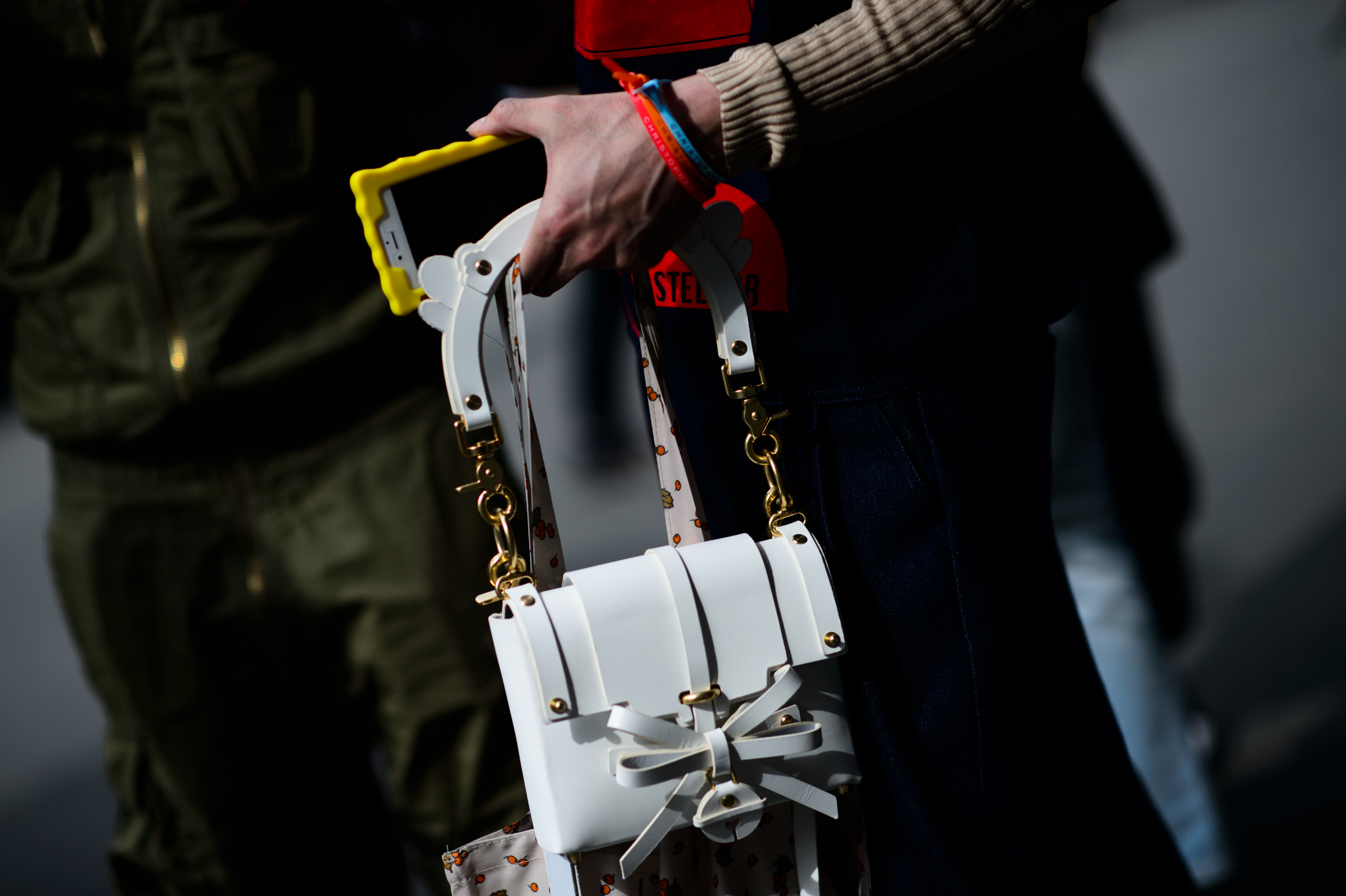 Japanese man holding white bag