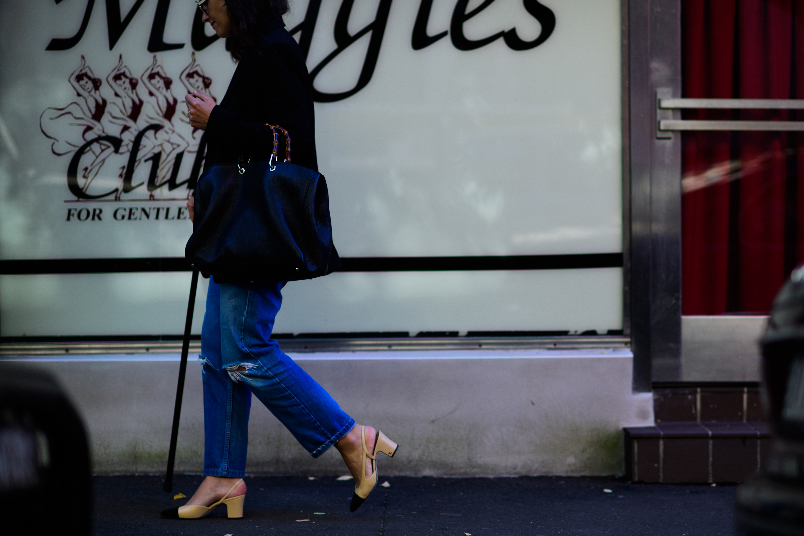 Woman wearing Chanel nude sandals