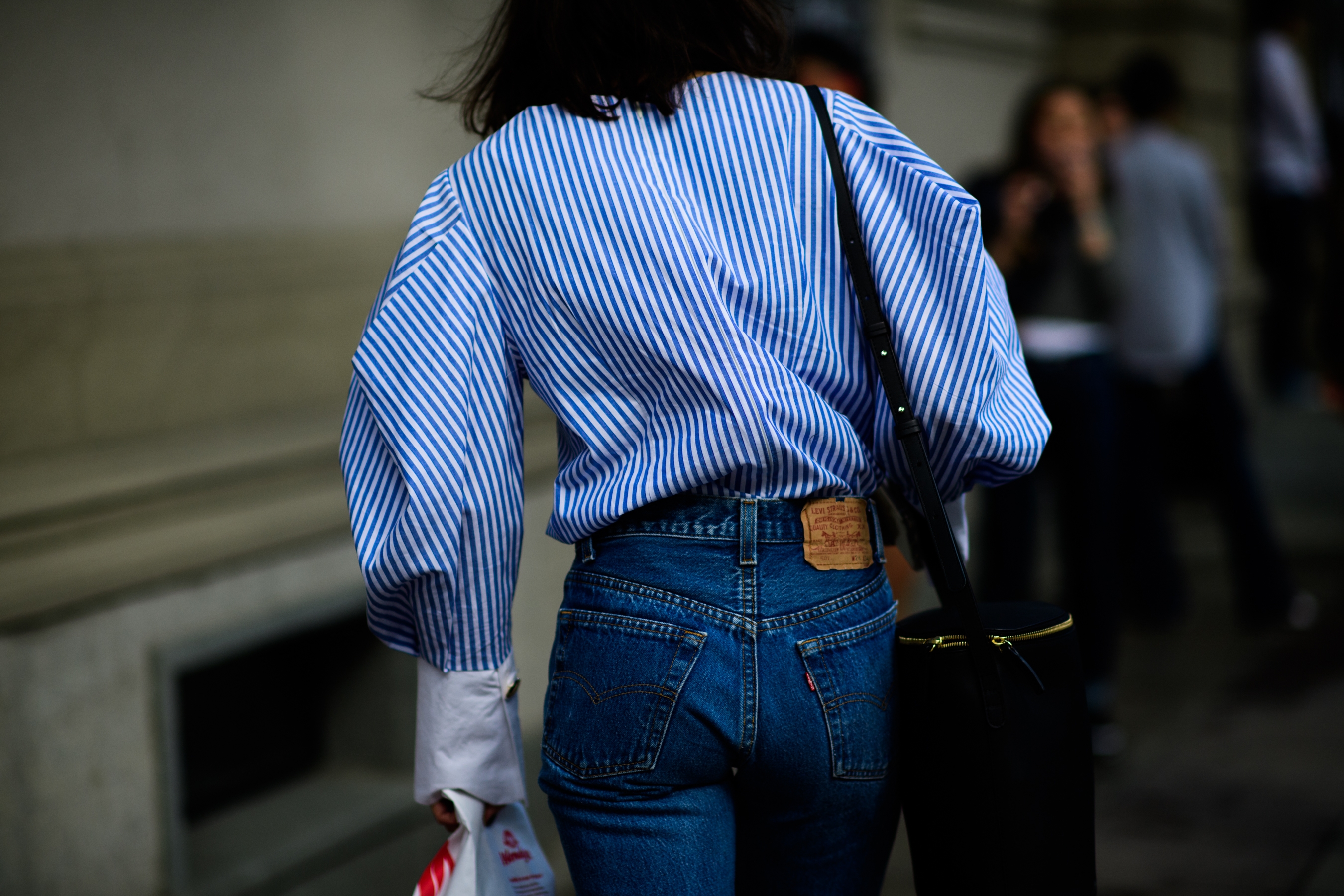 American girl wearing oversized shirt
