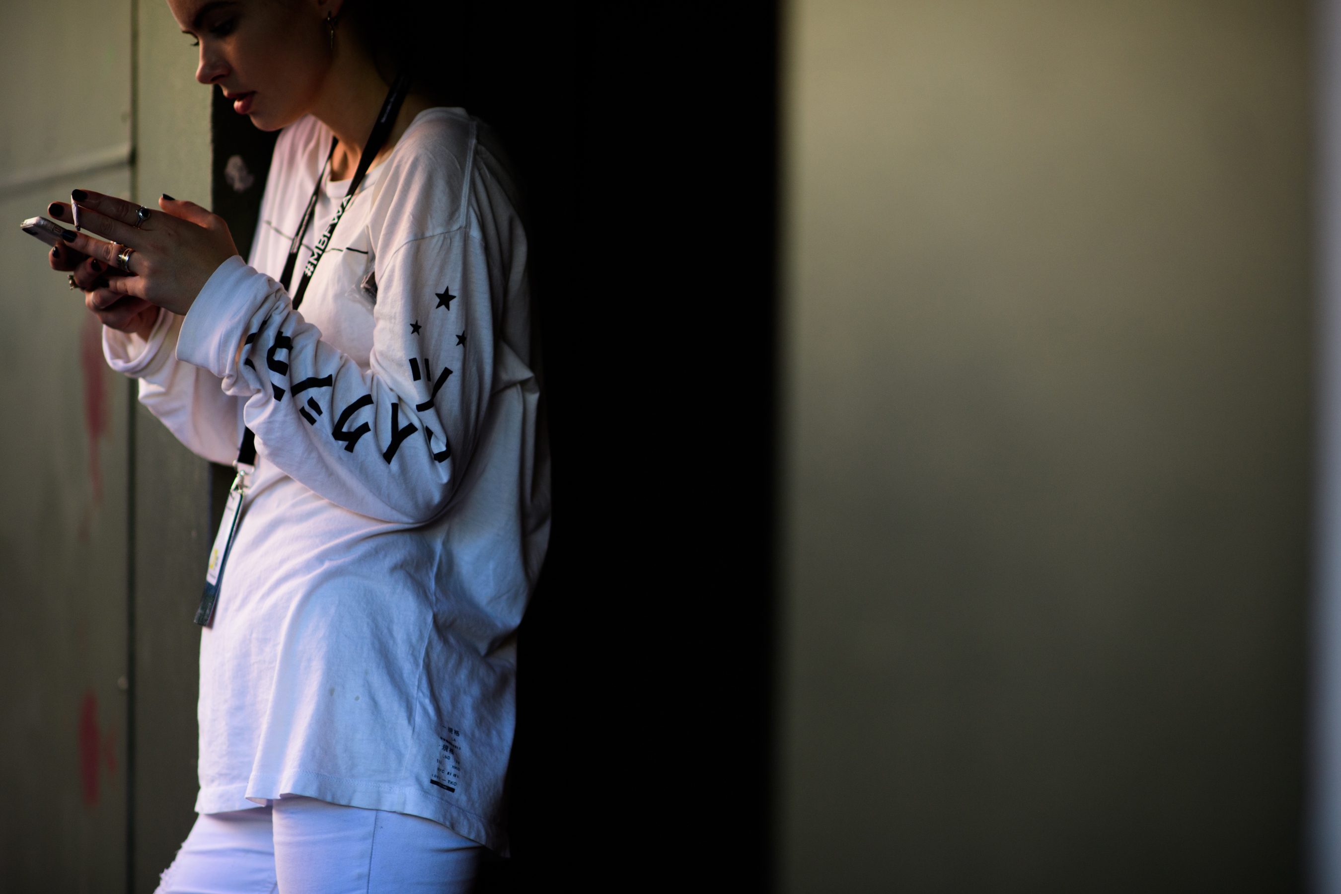 Woman wearing white sweatshirt