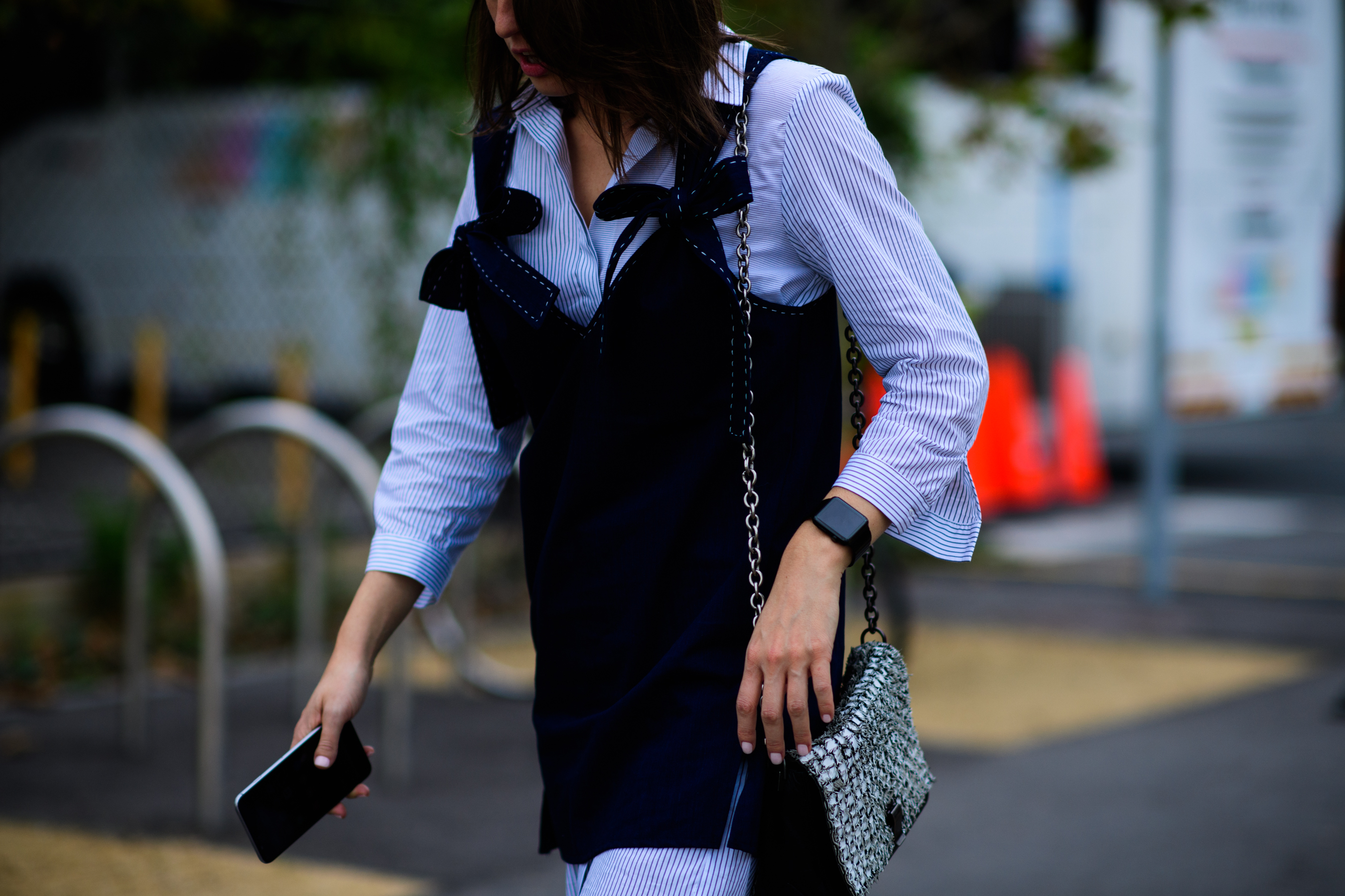 Woman wearing top over shirt