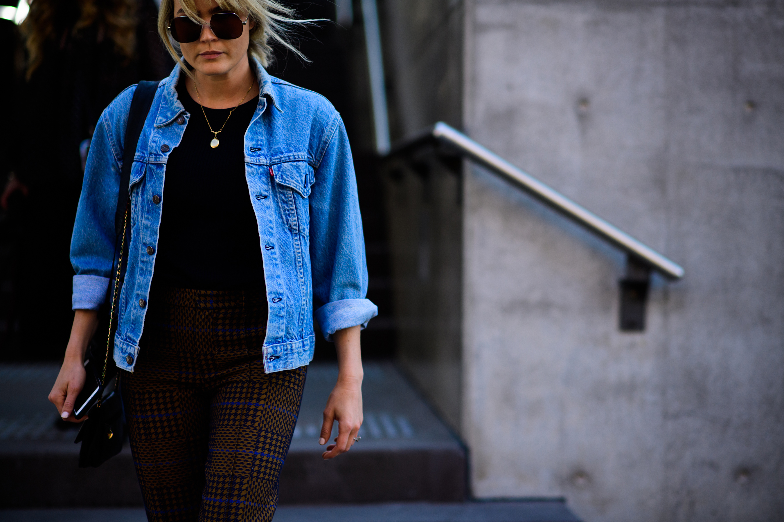 Woman wearing blue denim jacket