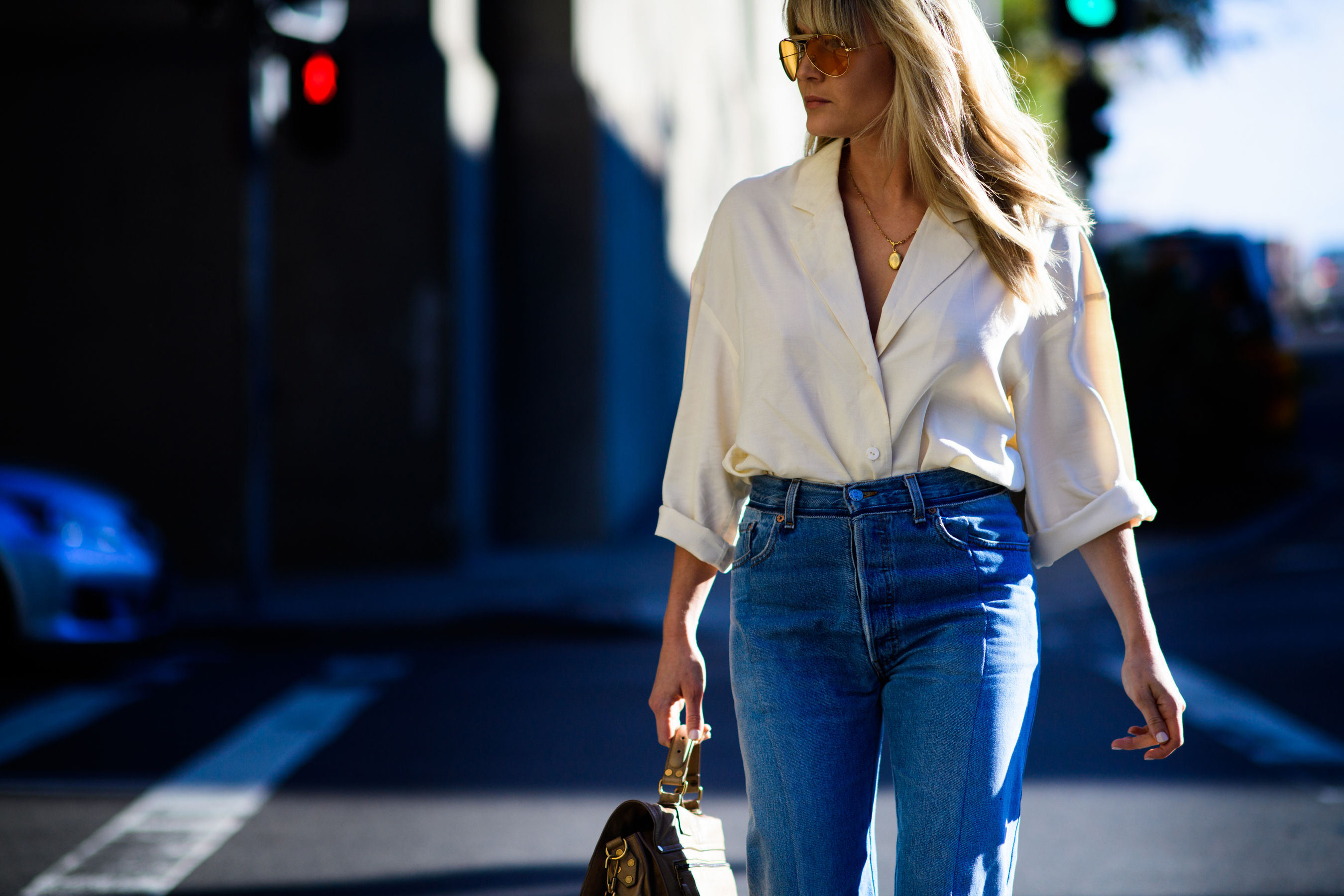 Woman wearing blue Vetements jeans