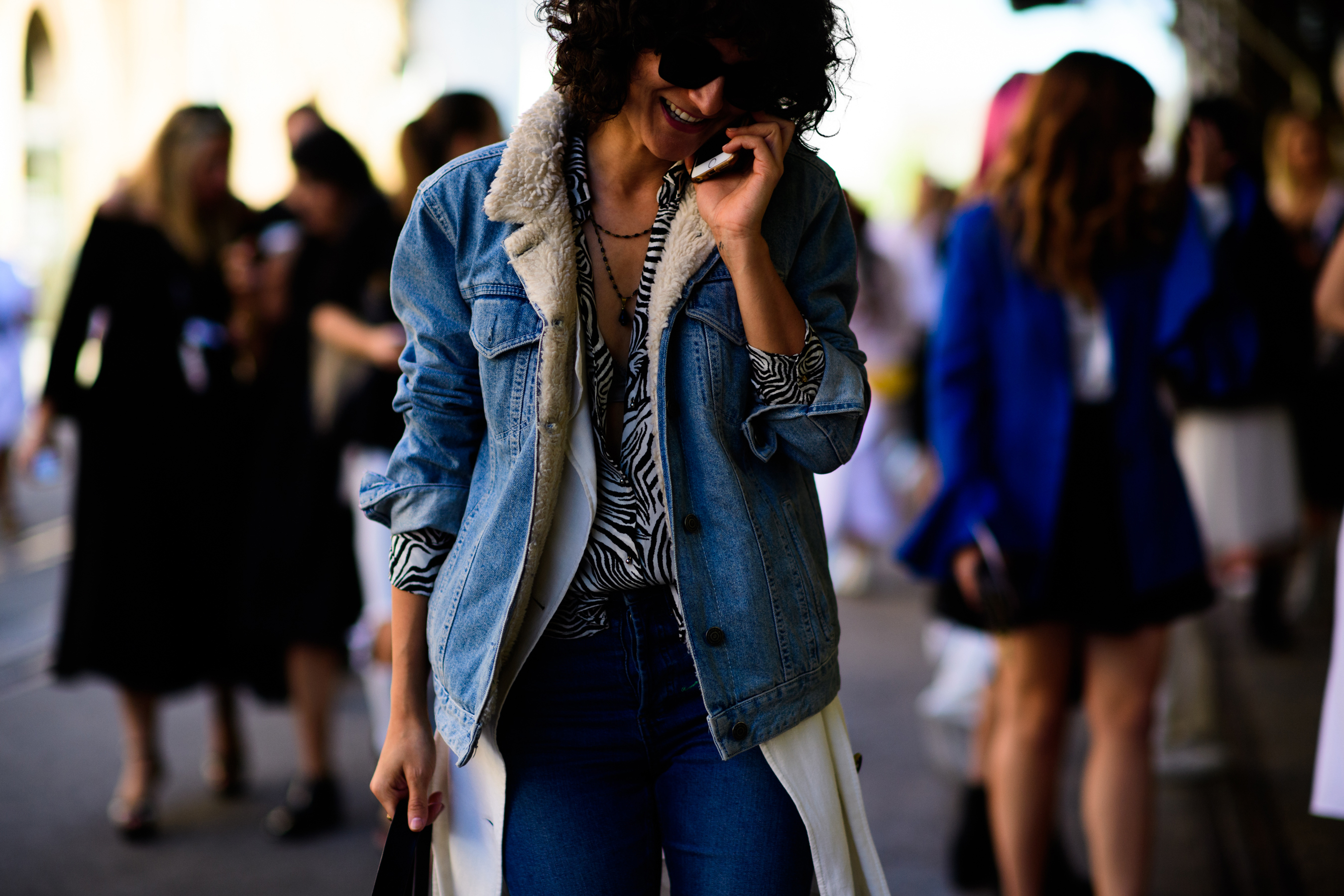 Woman wearing blue denim jacket