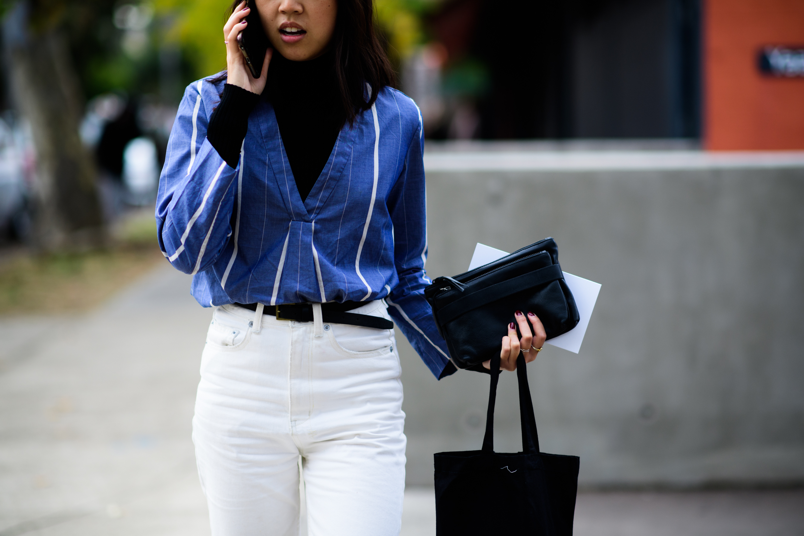 Girl wearing blue shirt with stripe