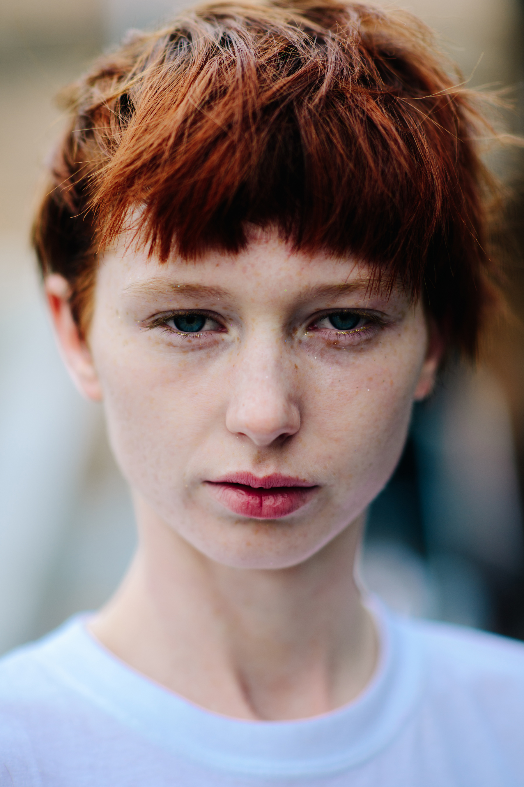 Portrait of a model with short red hair