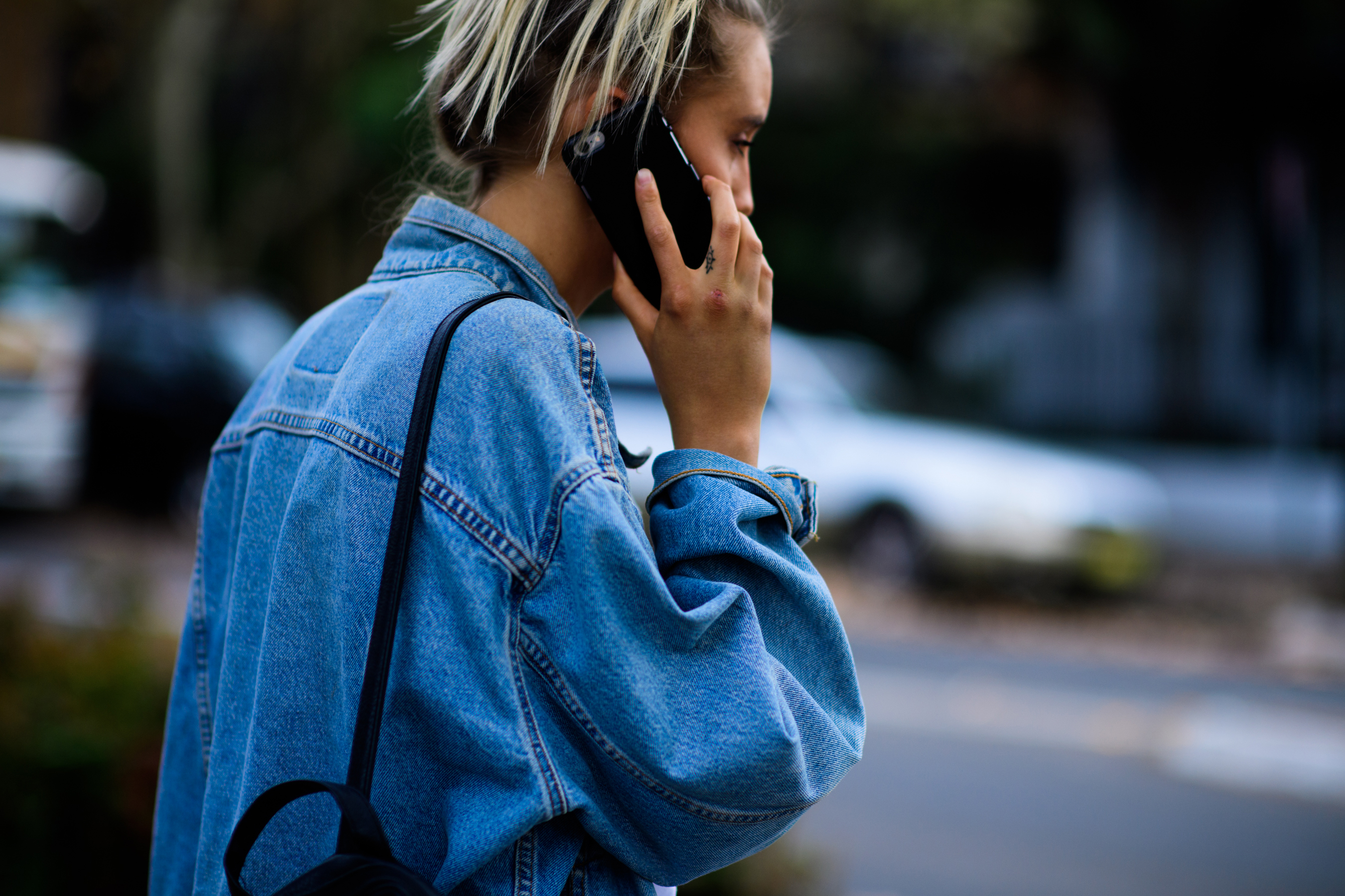 Girl wearing oversized denim jacket