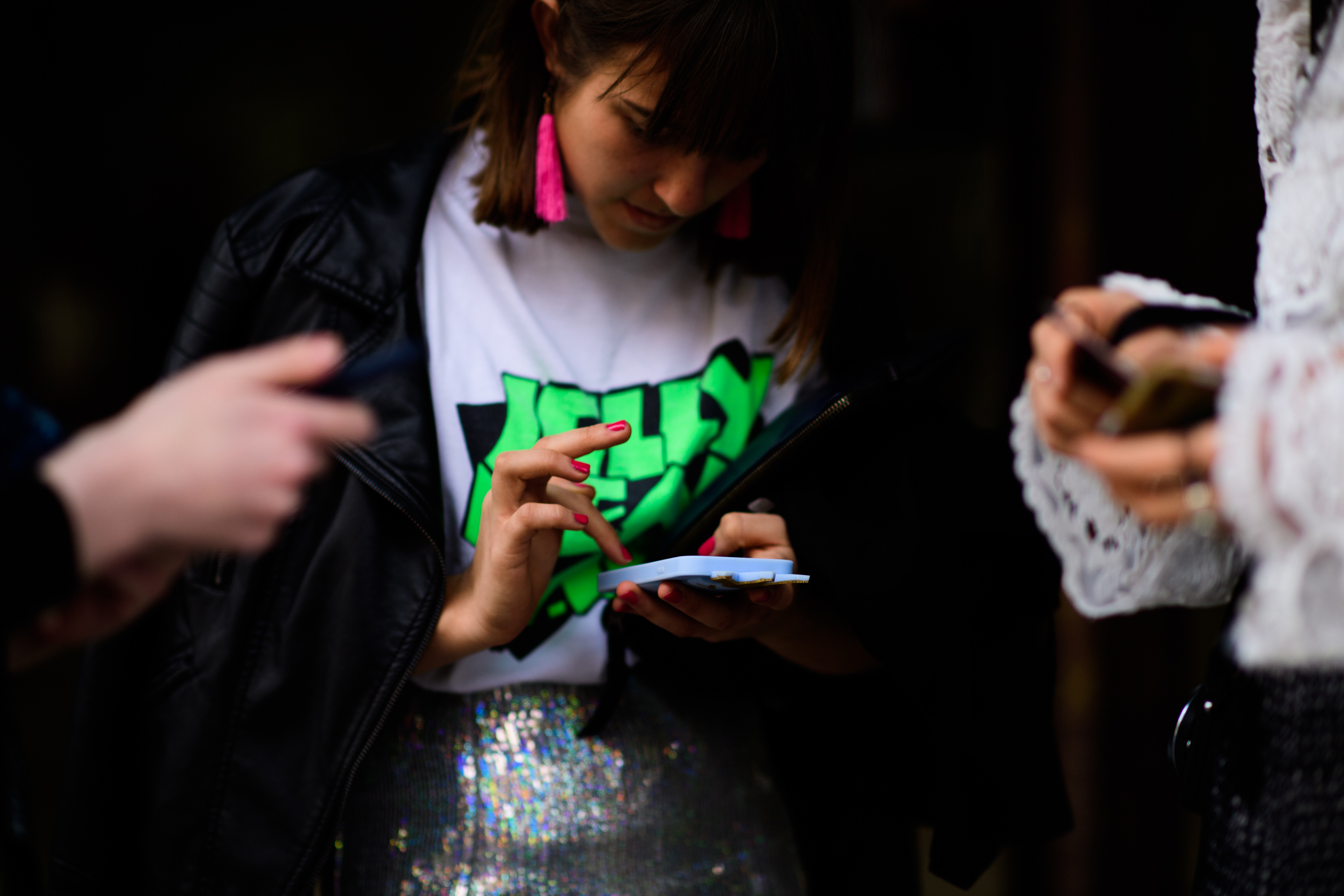 Woman wearing shiny silver skirt