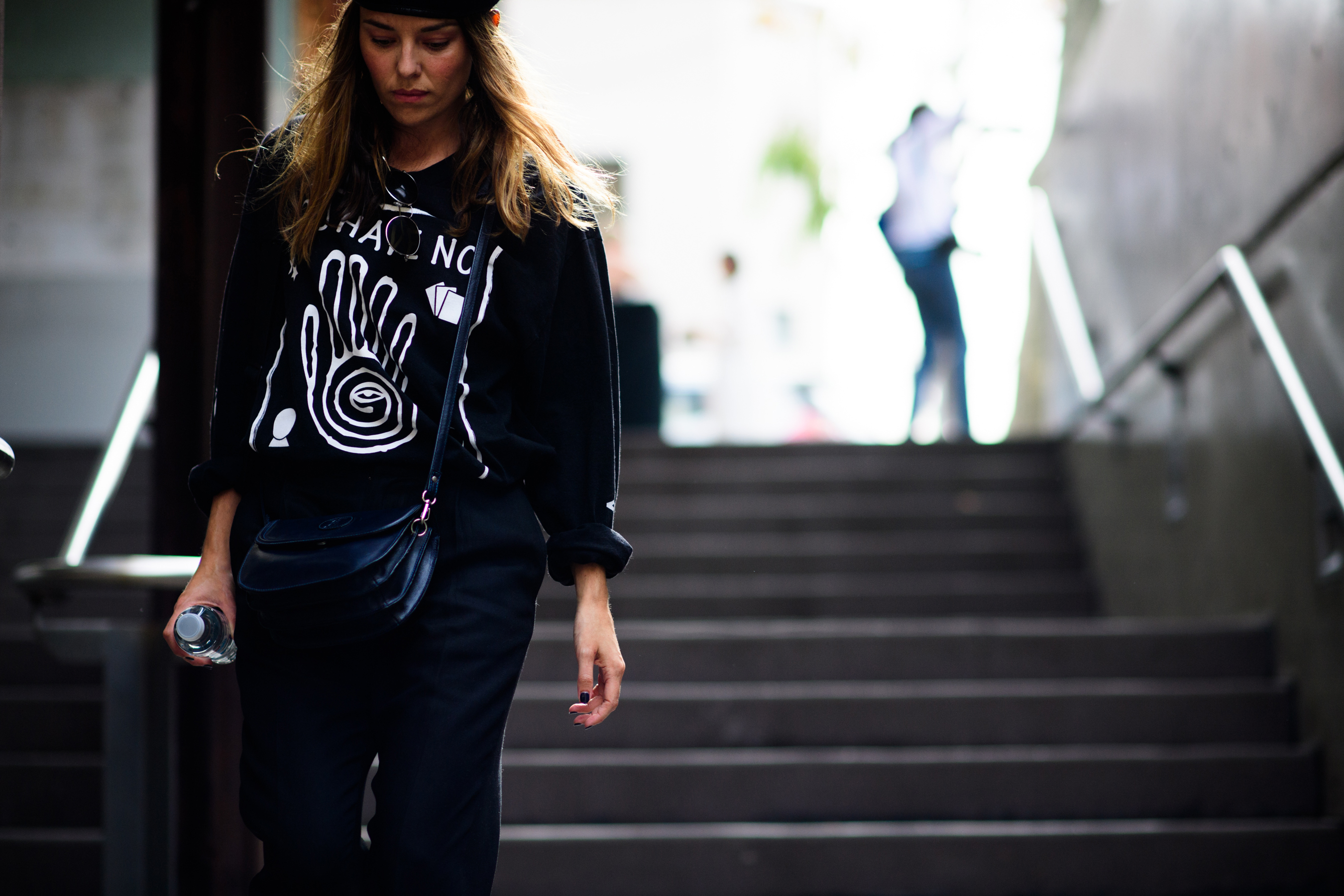 Girl wearing top with white print