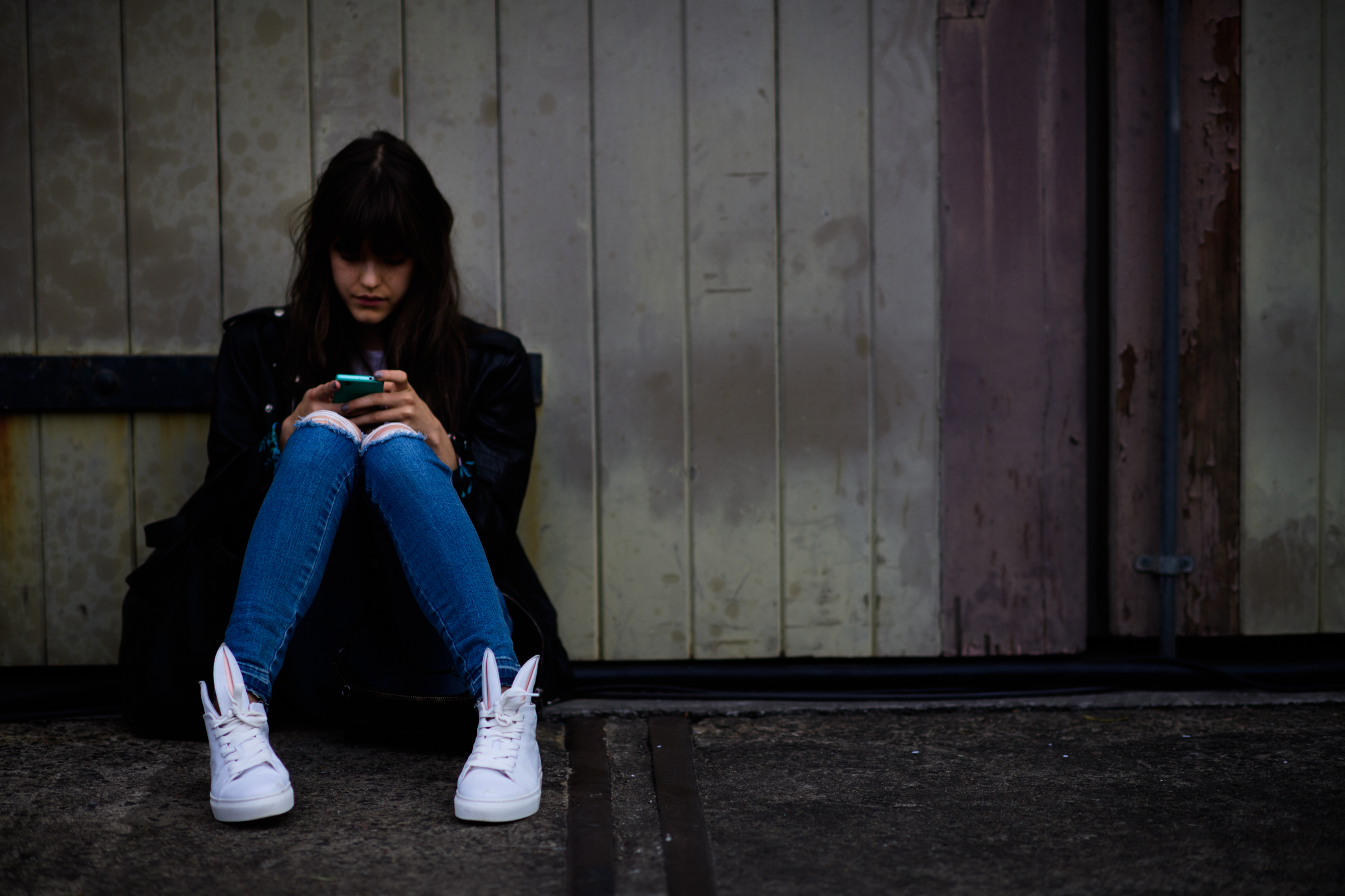 Model wearing sneakers with ears
