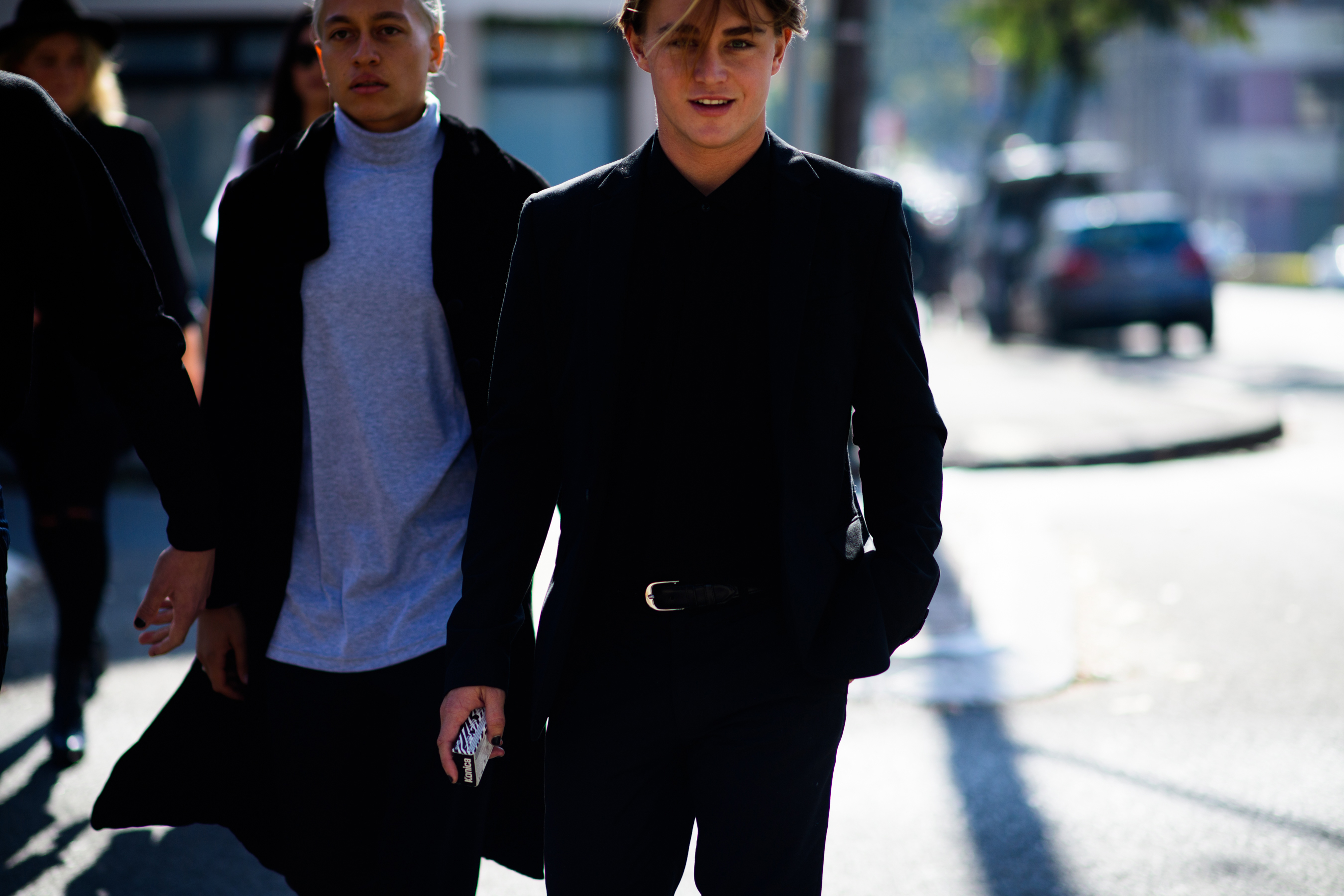 Two male models after the show