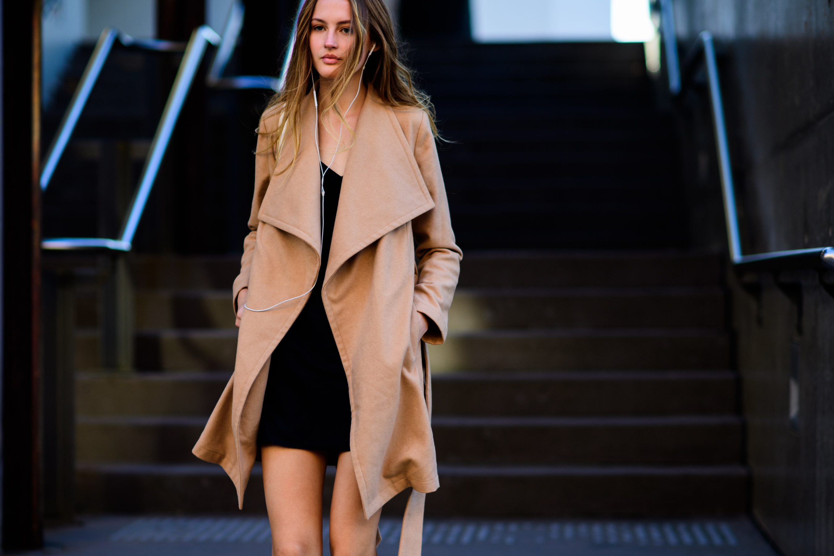 Beautiful model wearing beige coat