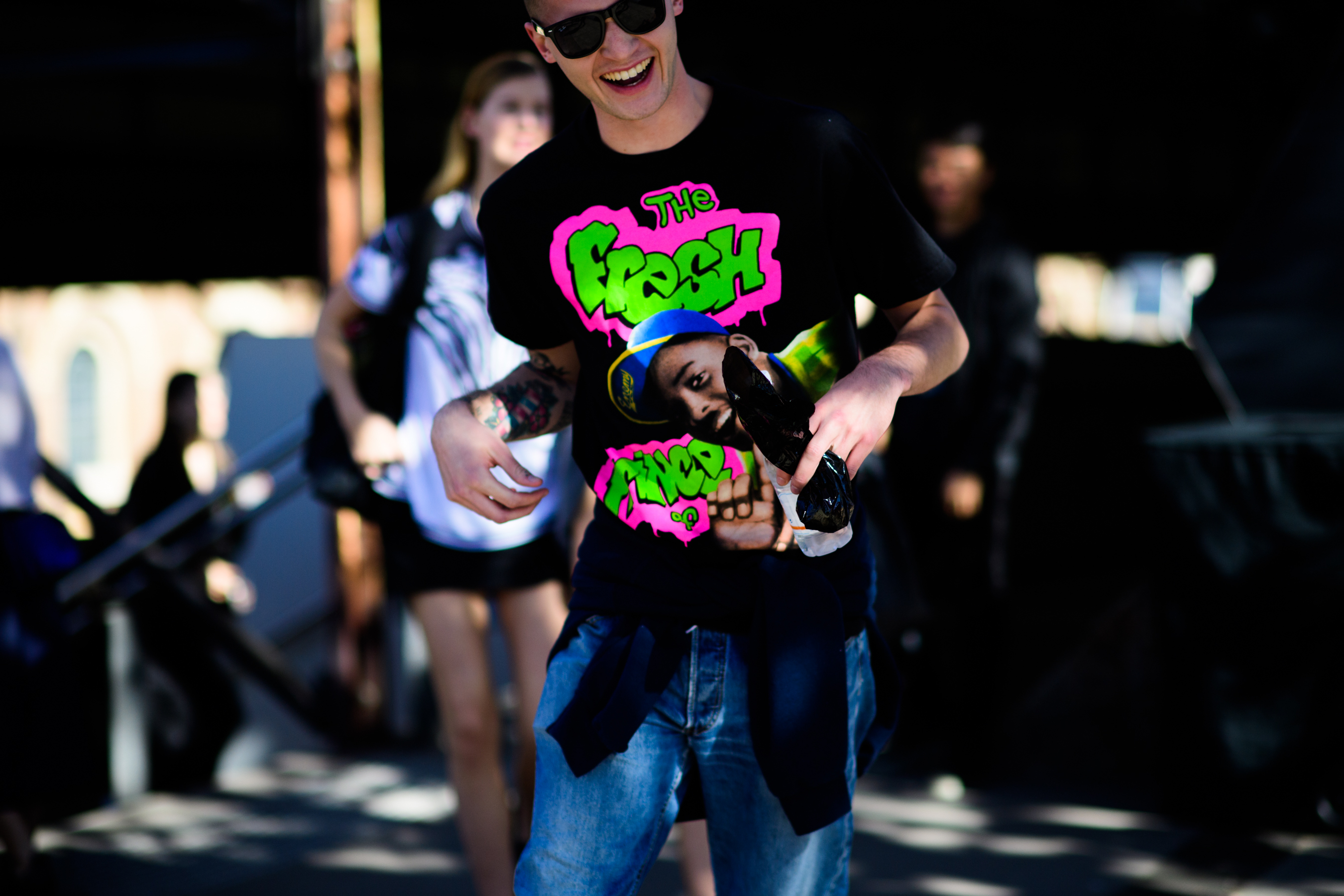 Man wearing t-shirt with rapper