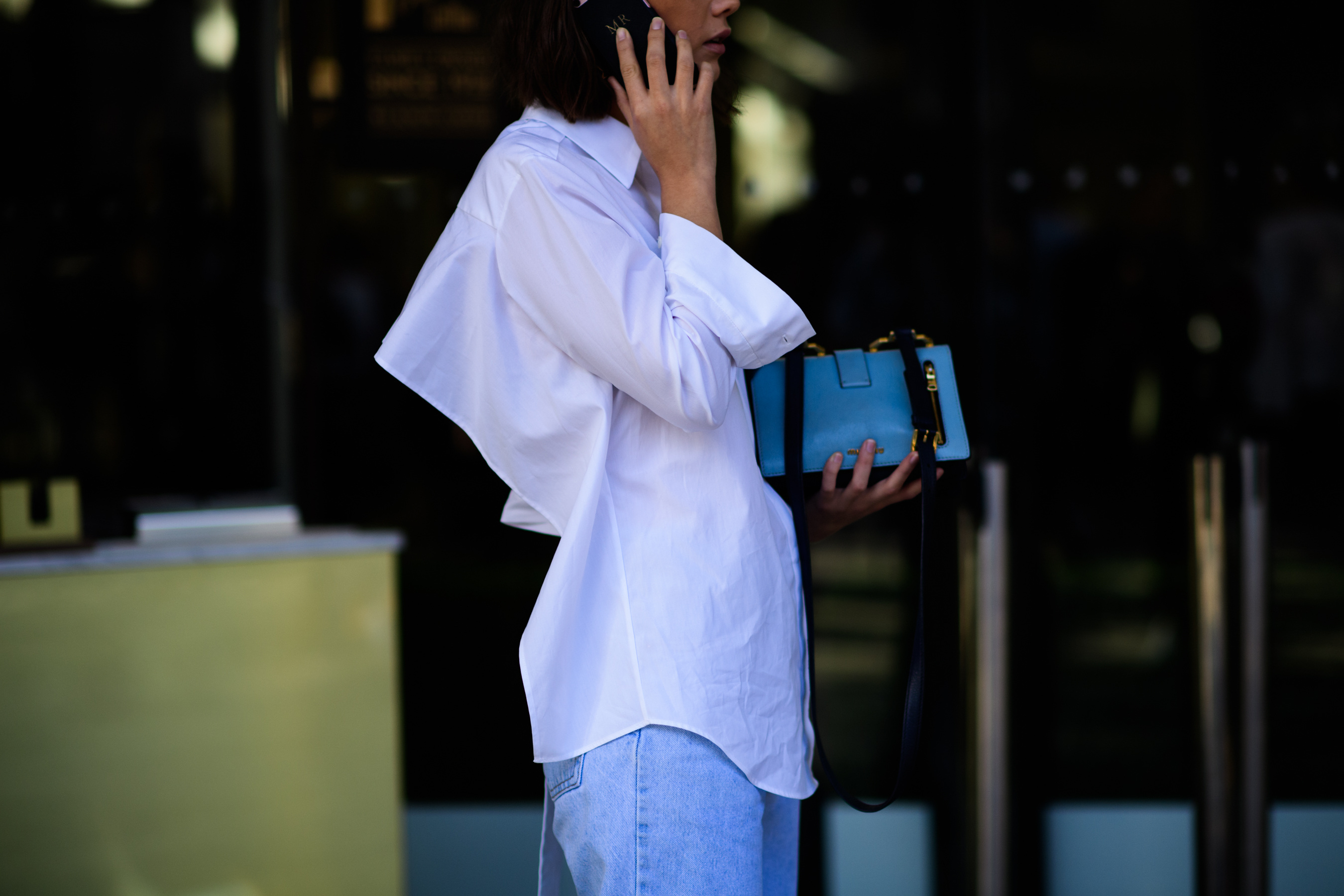 Woman wearing white oversized shirt