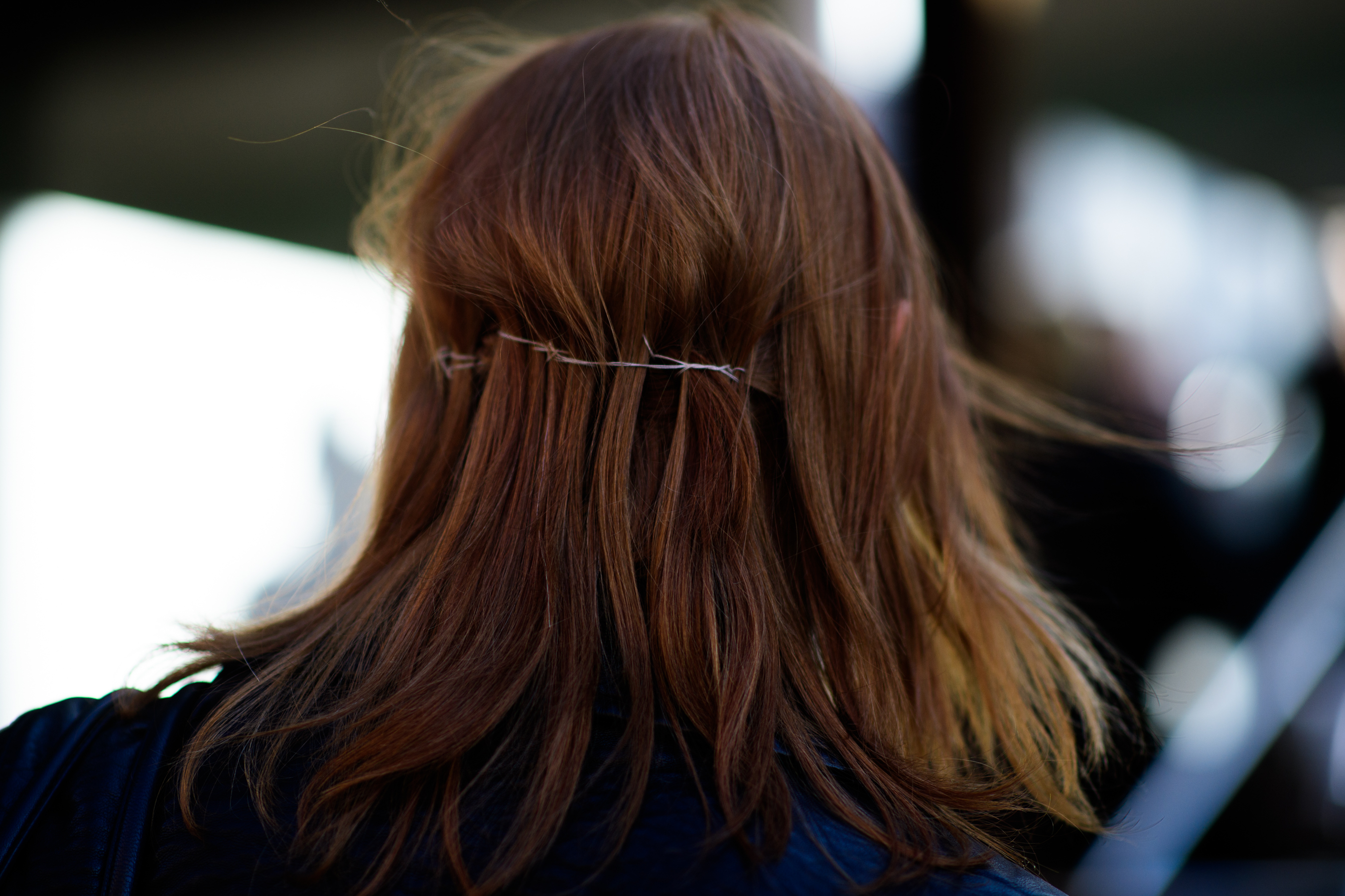 Back of a model's head with clipped hair