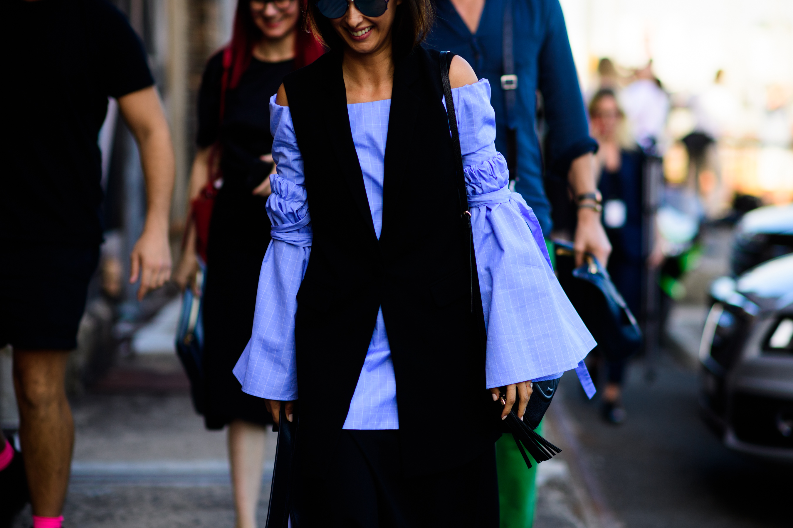 Woman wearing Ellery shirt bell sleeve