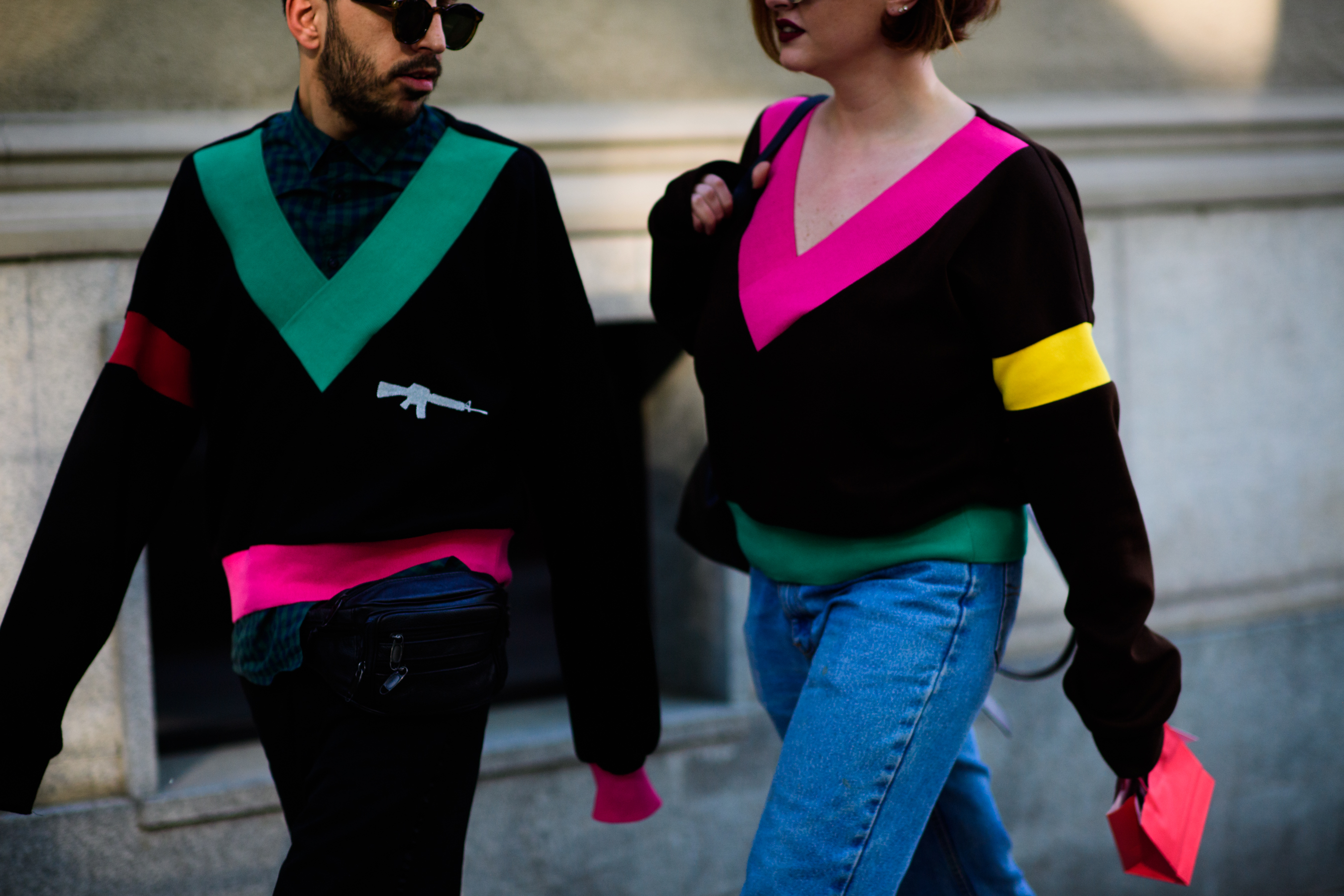 Two Georgians wearing matching sweaters