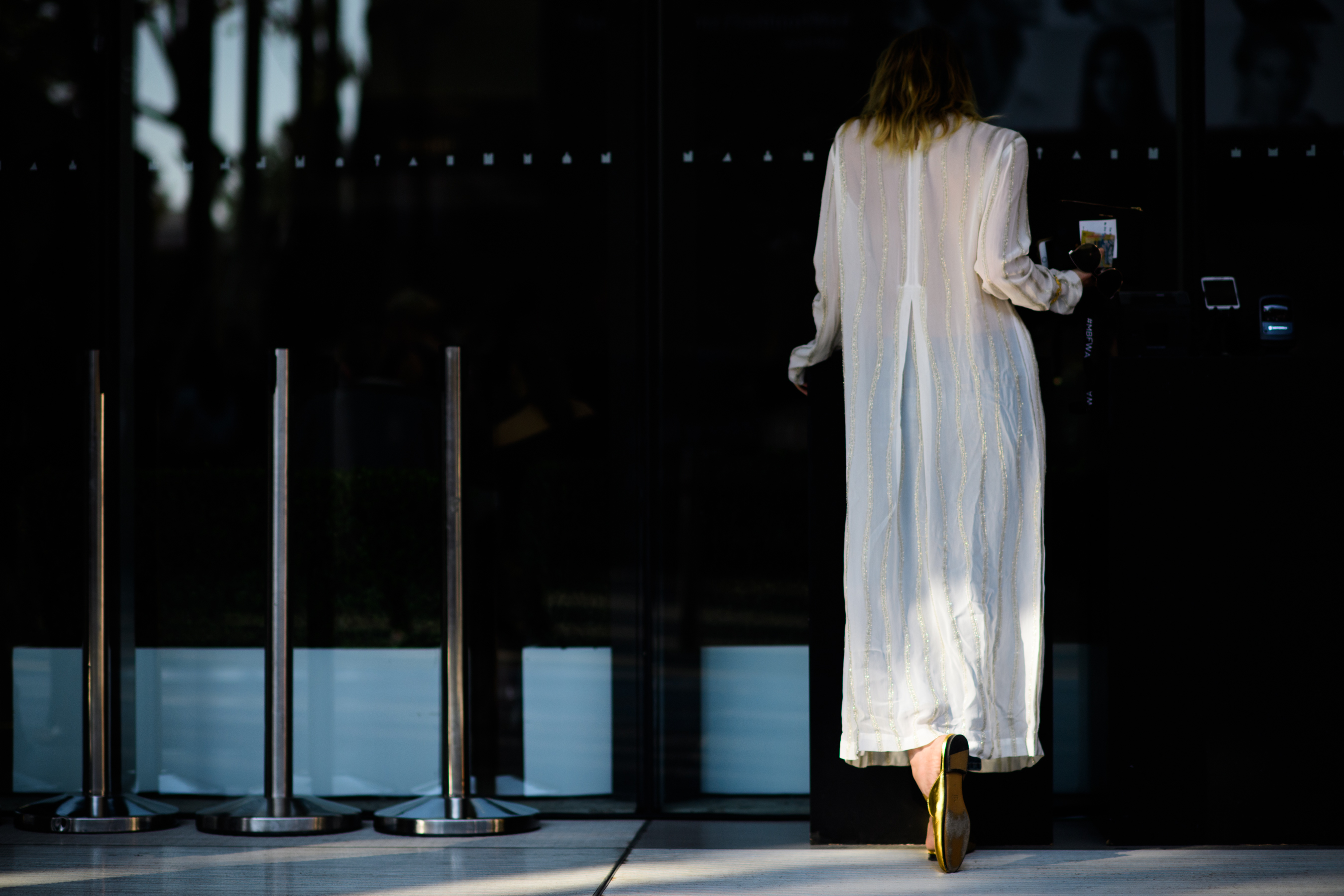 Blogger wearing long white cardigan