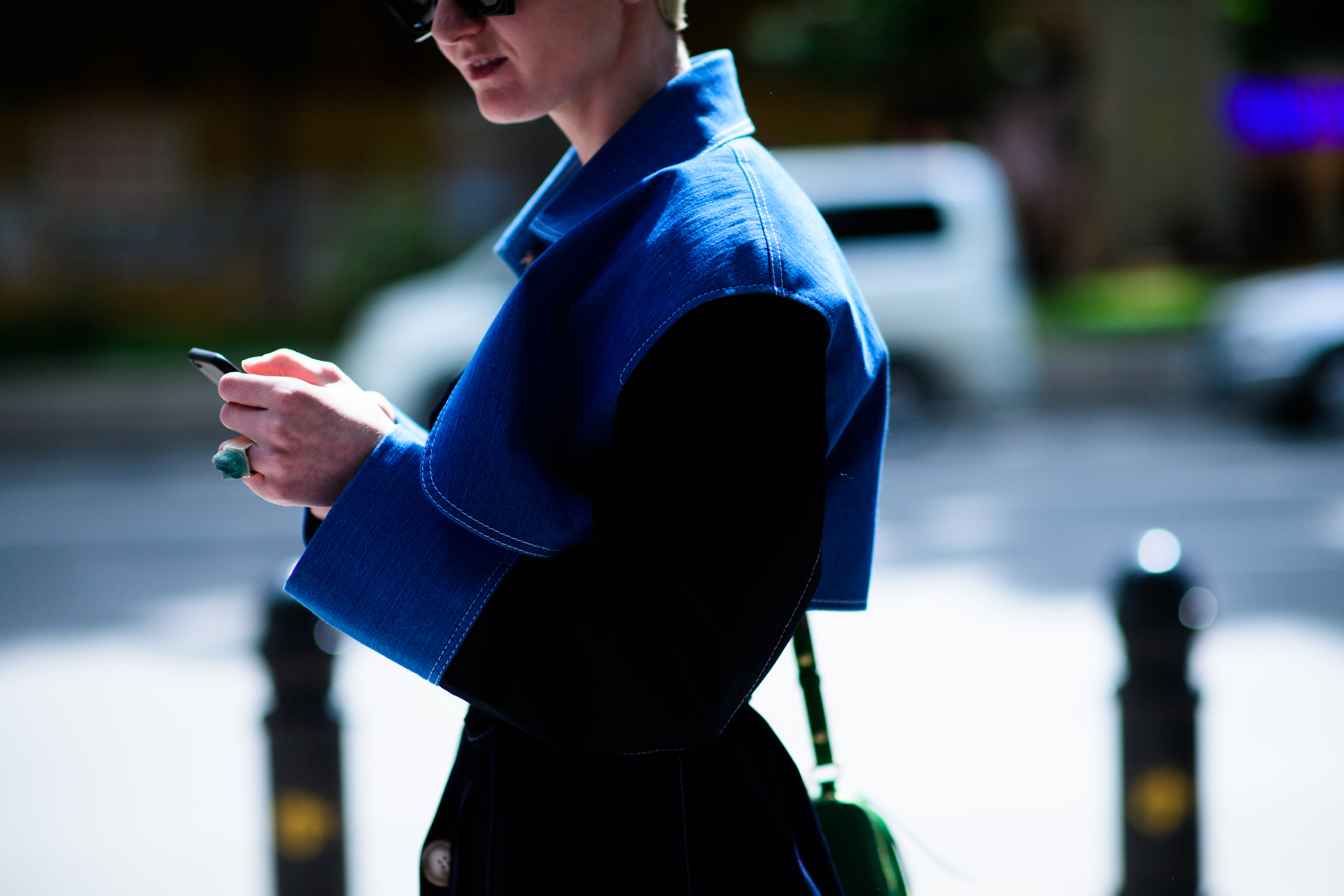 Ukrainian Vogue editor wearing blue coat
