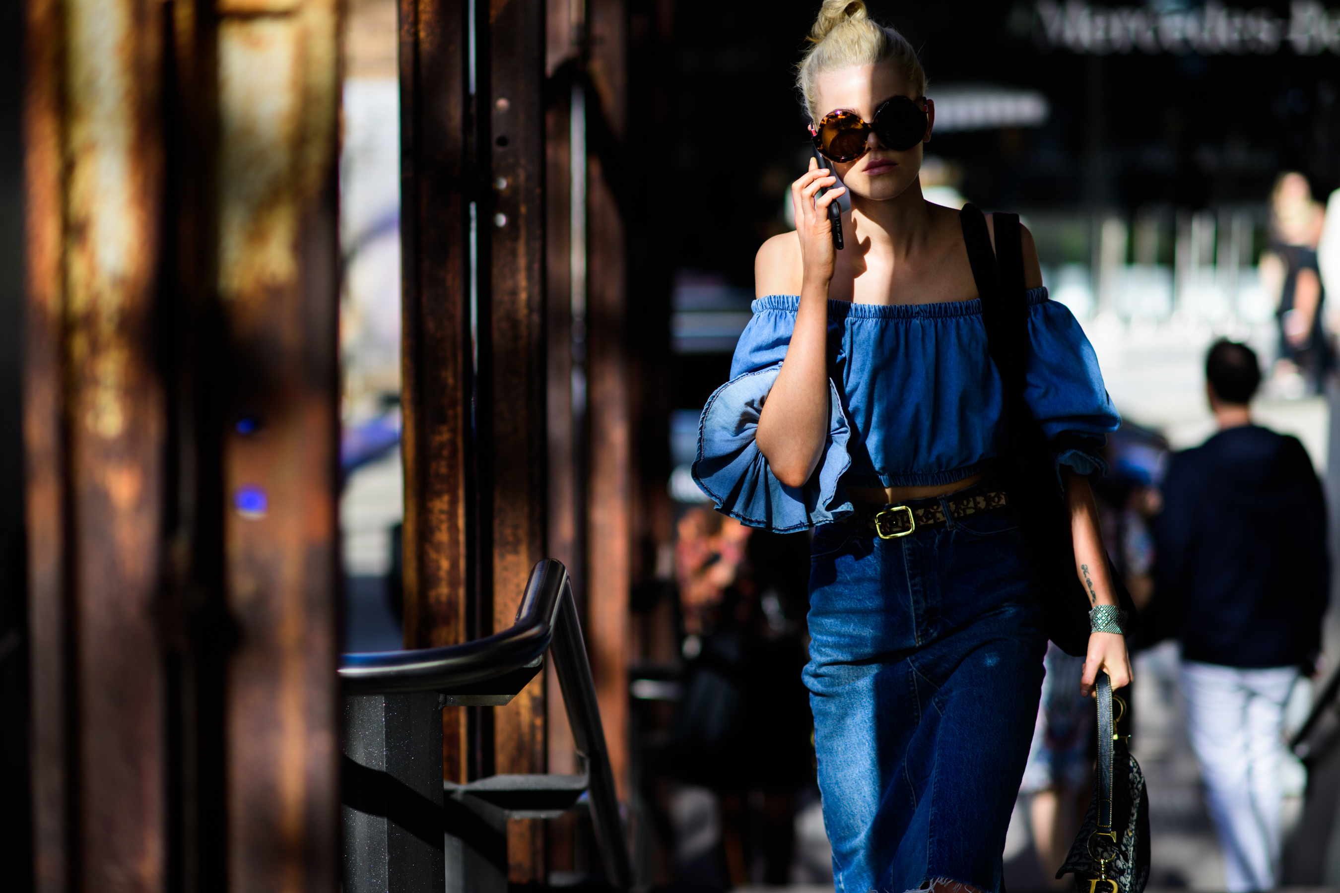 Model wearing blue crop top
