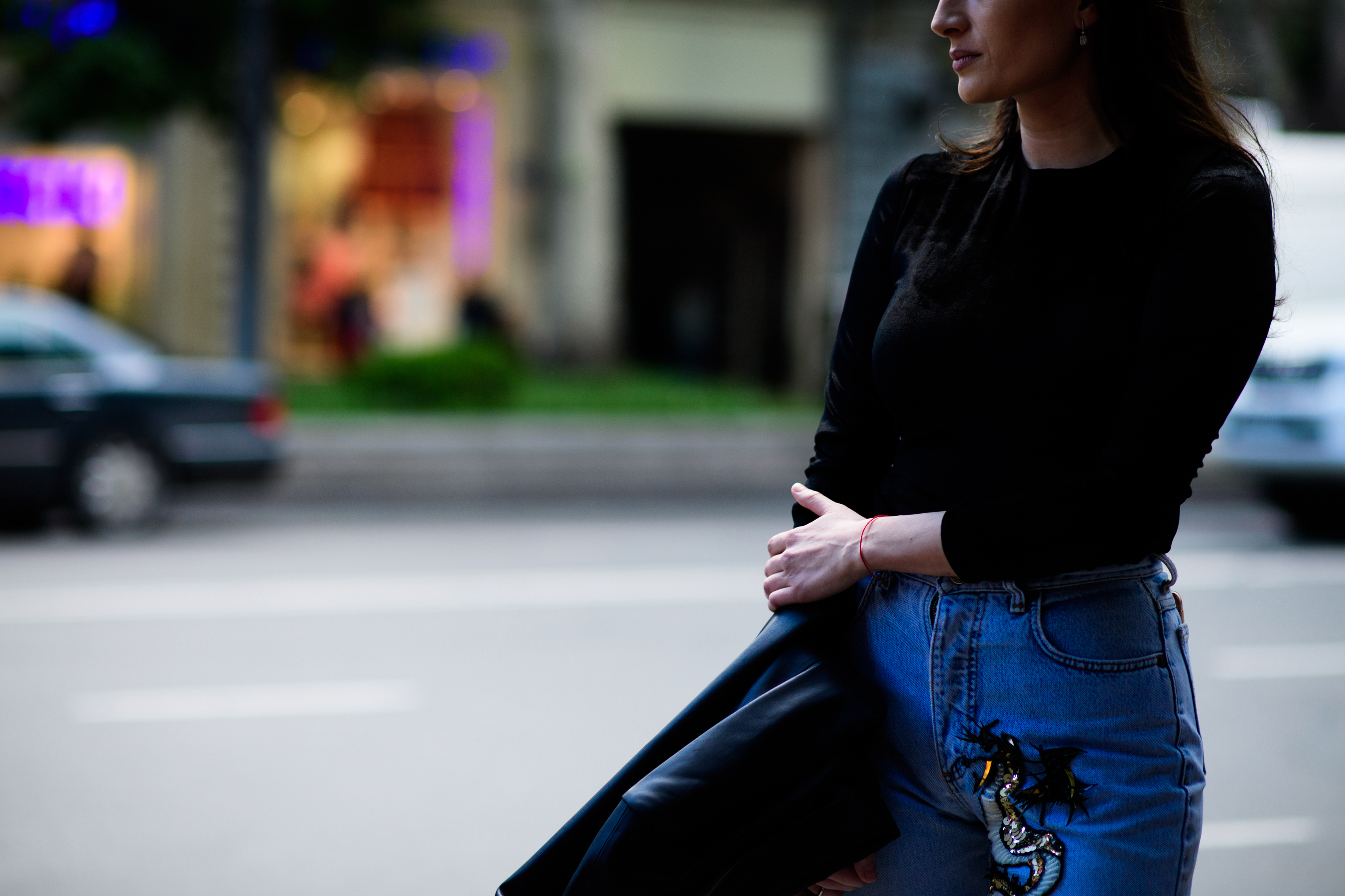 Woman wearing jeans with embroidery