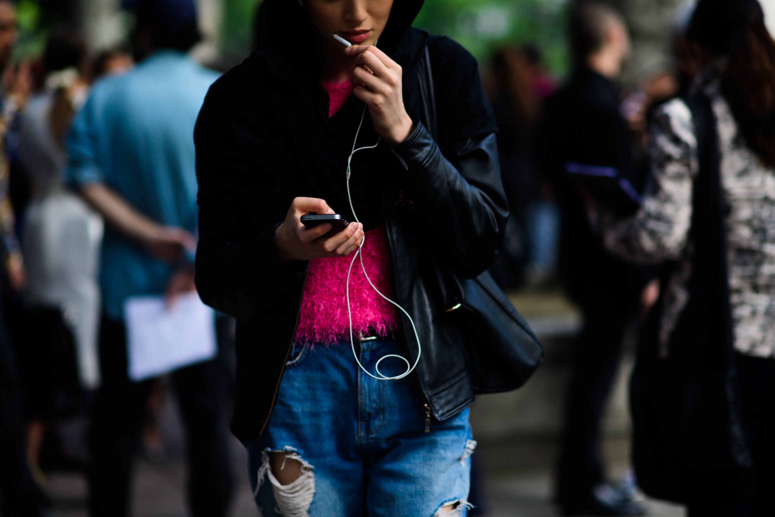 Model wearing pink top after show