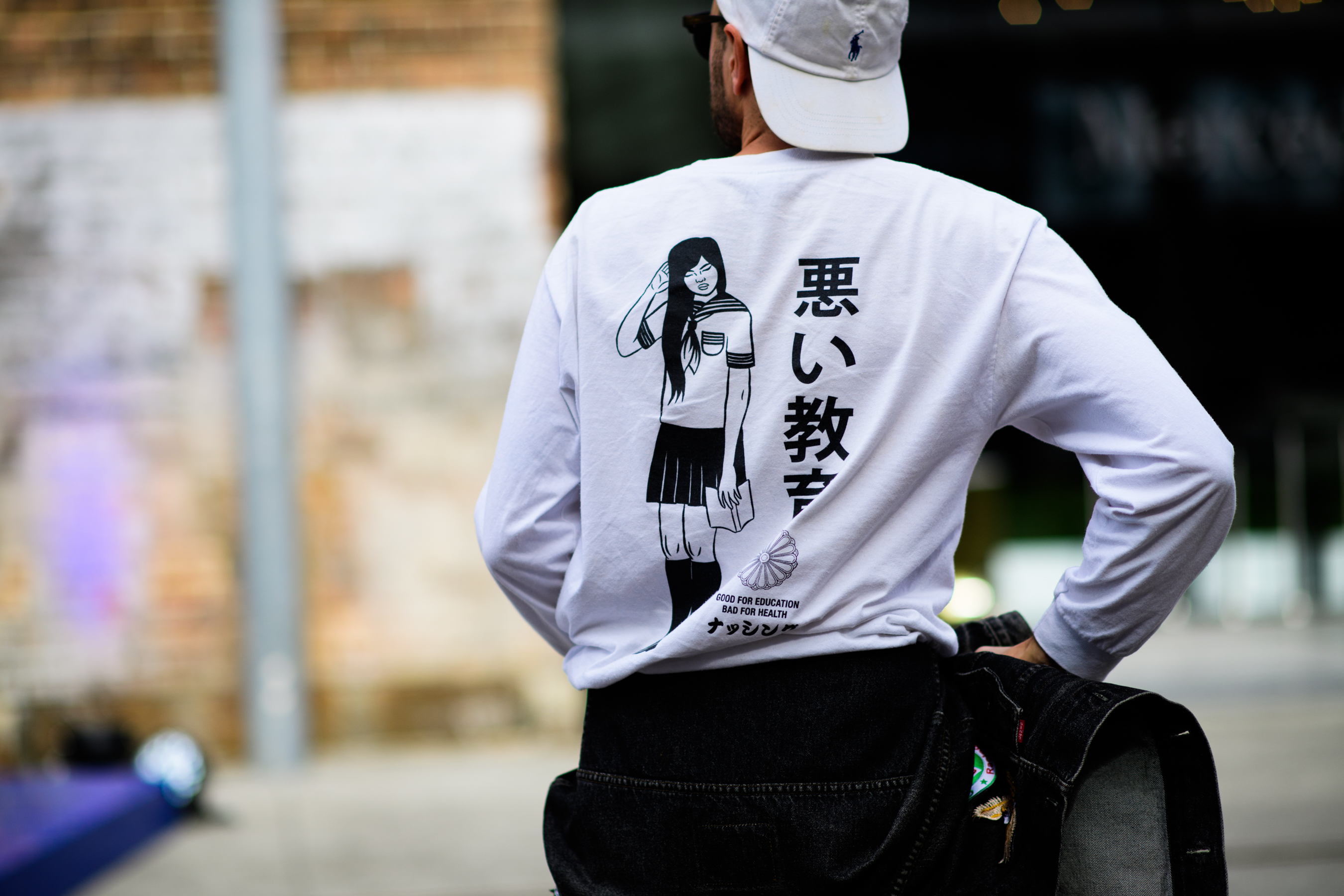 Photographer wearing sweatshirt with print