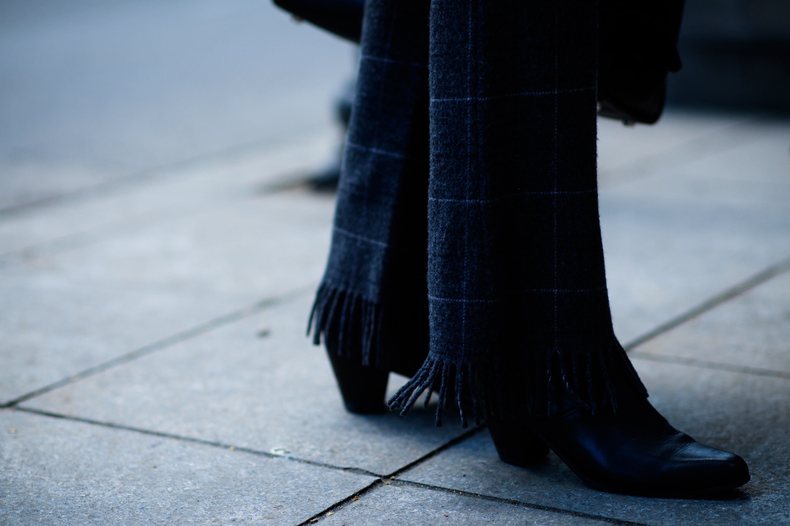 Kazakh photographer wearing ruffled pants