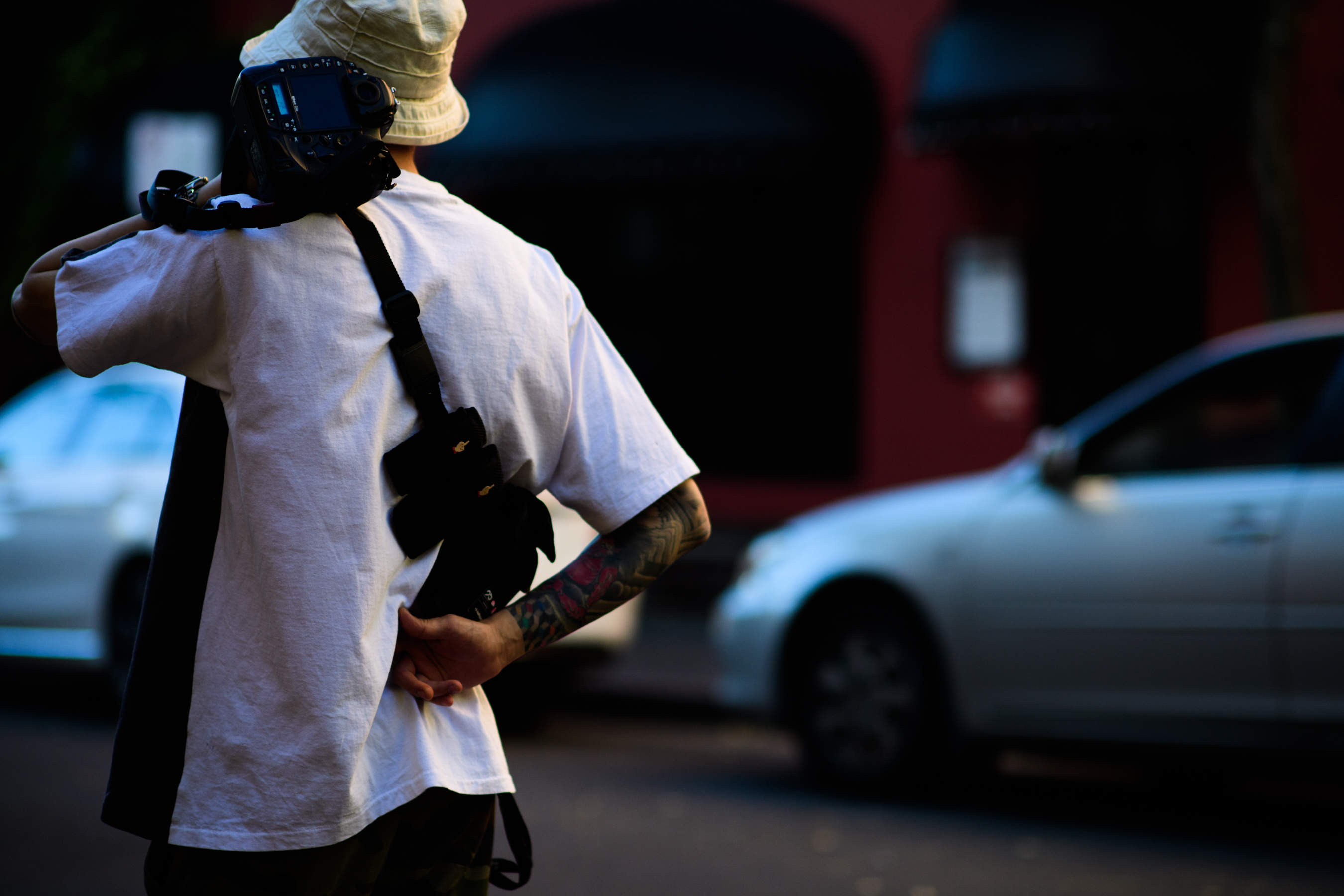 Korean photographer wearing white shirt