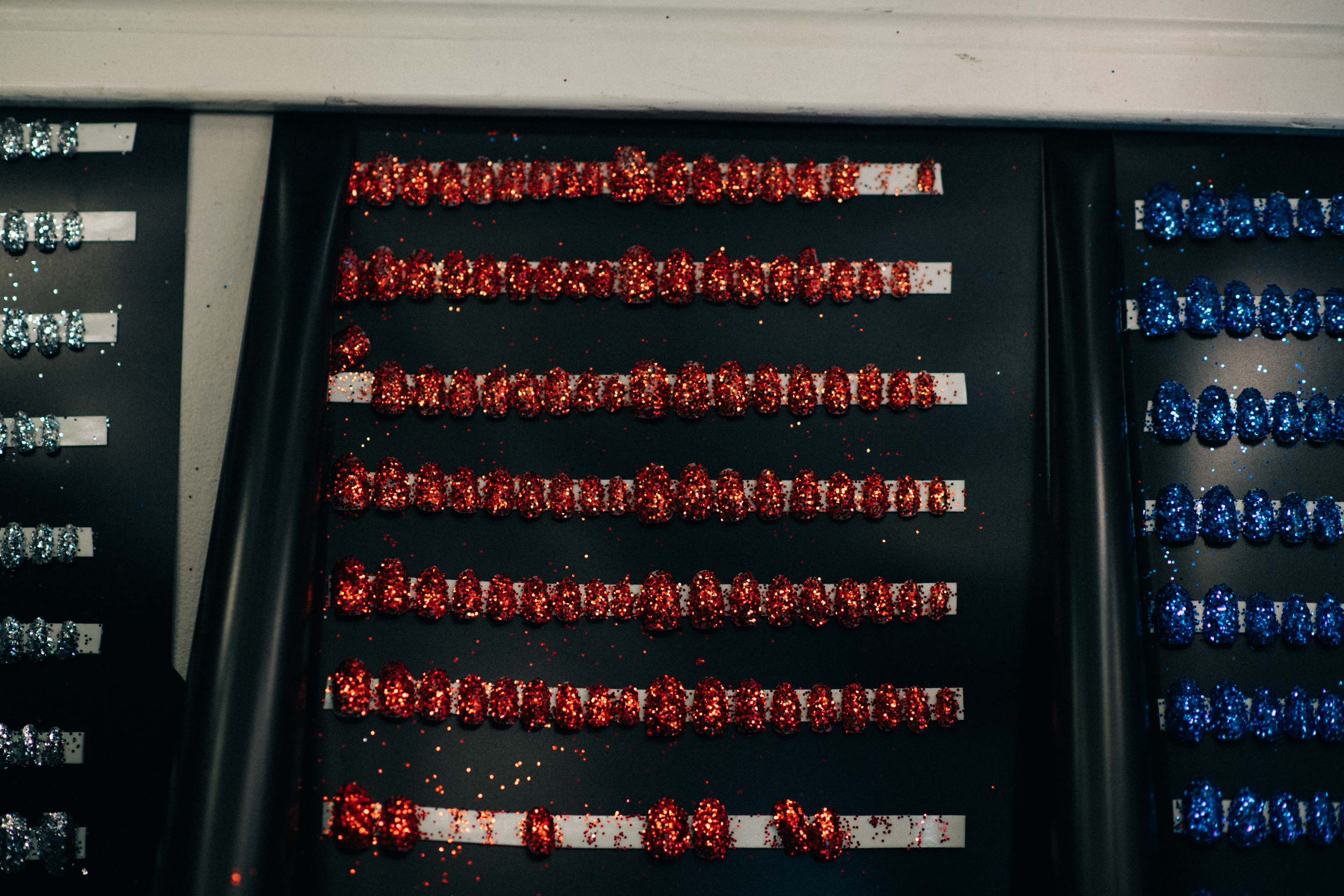 Bright red details, accessories backstage