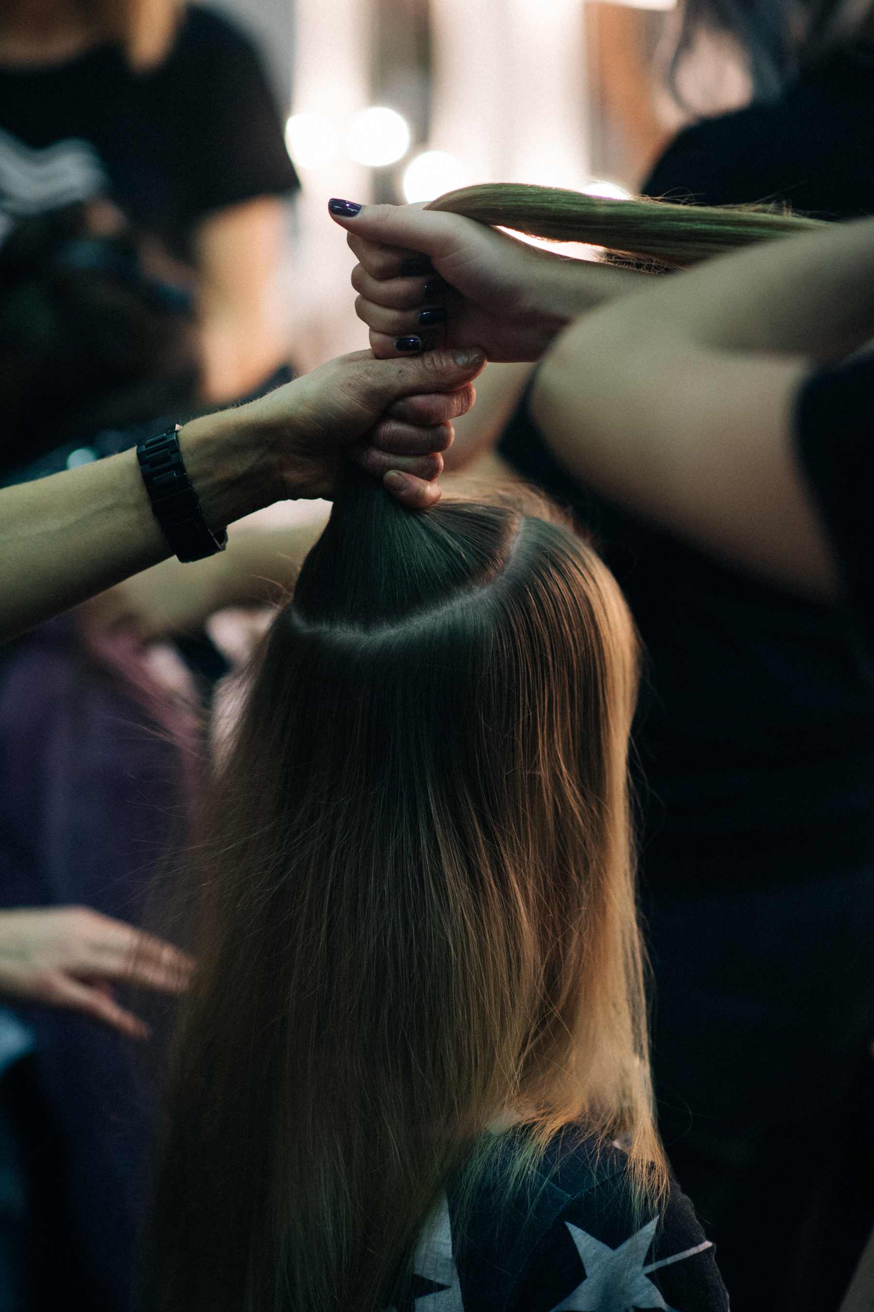 Model backstage getting her hair done
