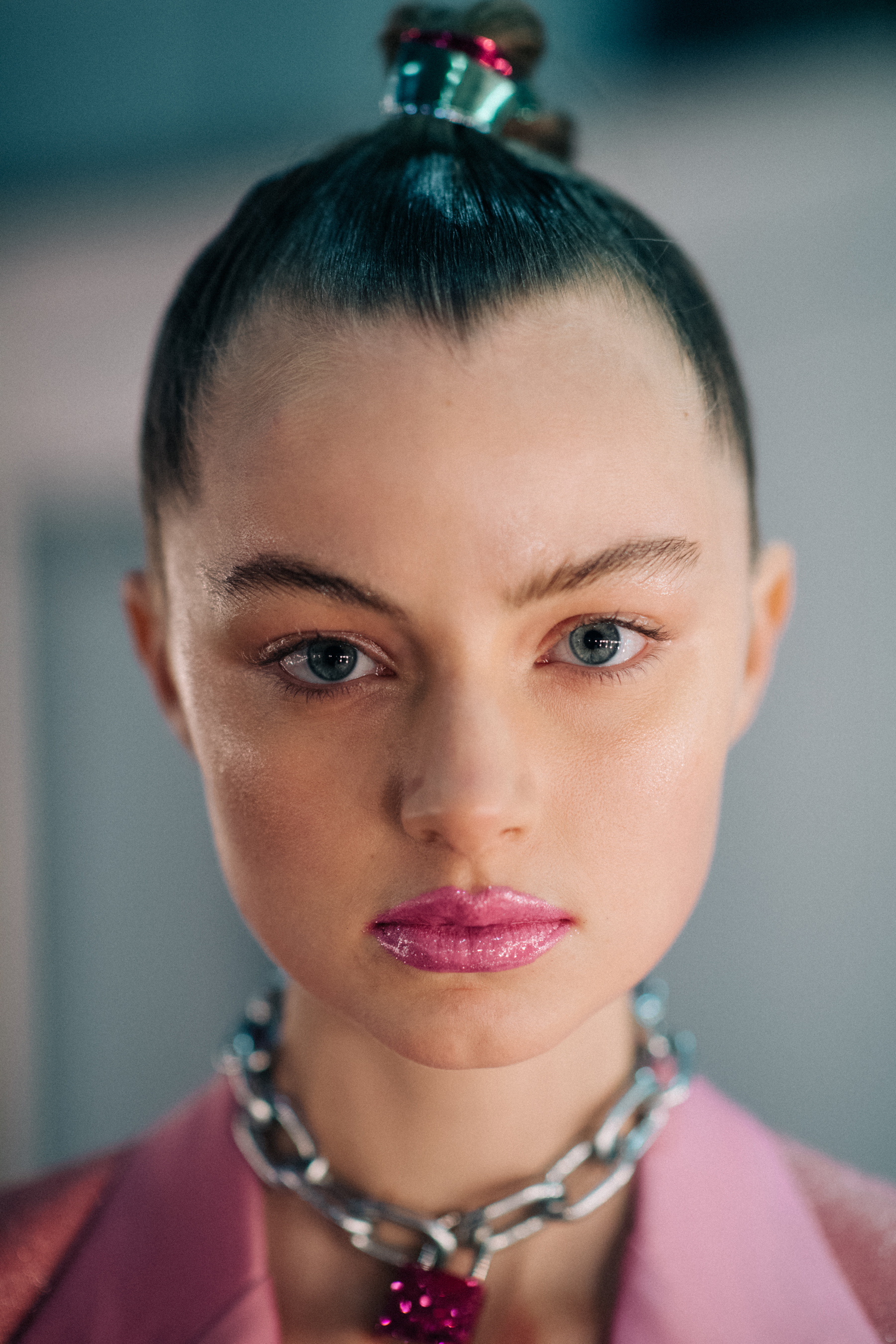 Portrait of a girl with pink lips and grey eyes