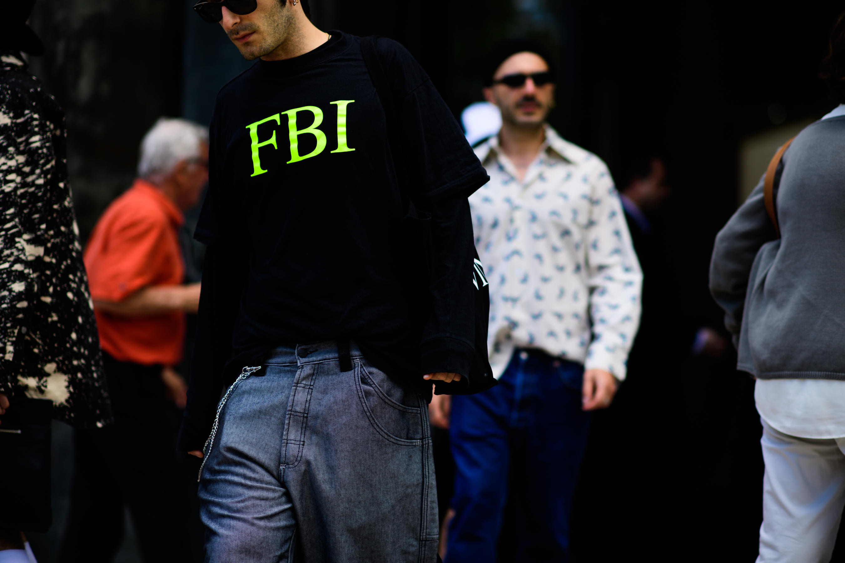A man wearing a black sweatshirt