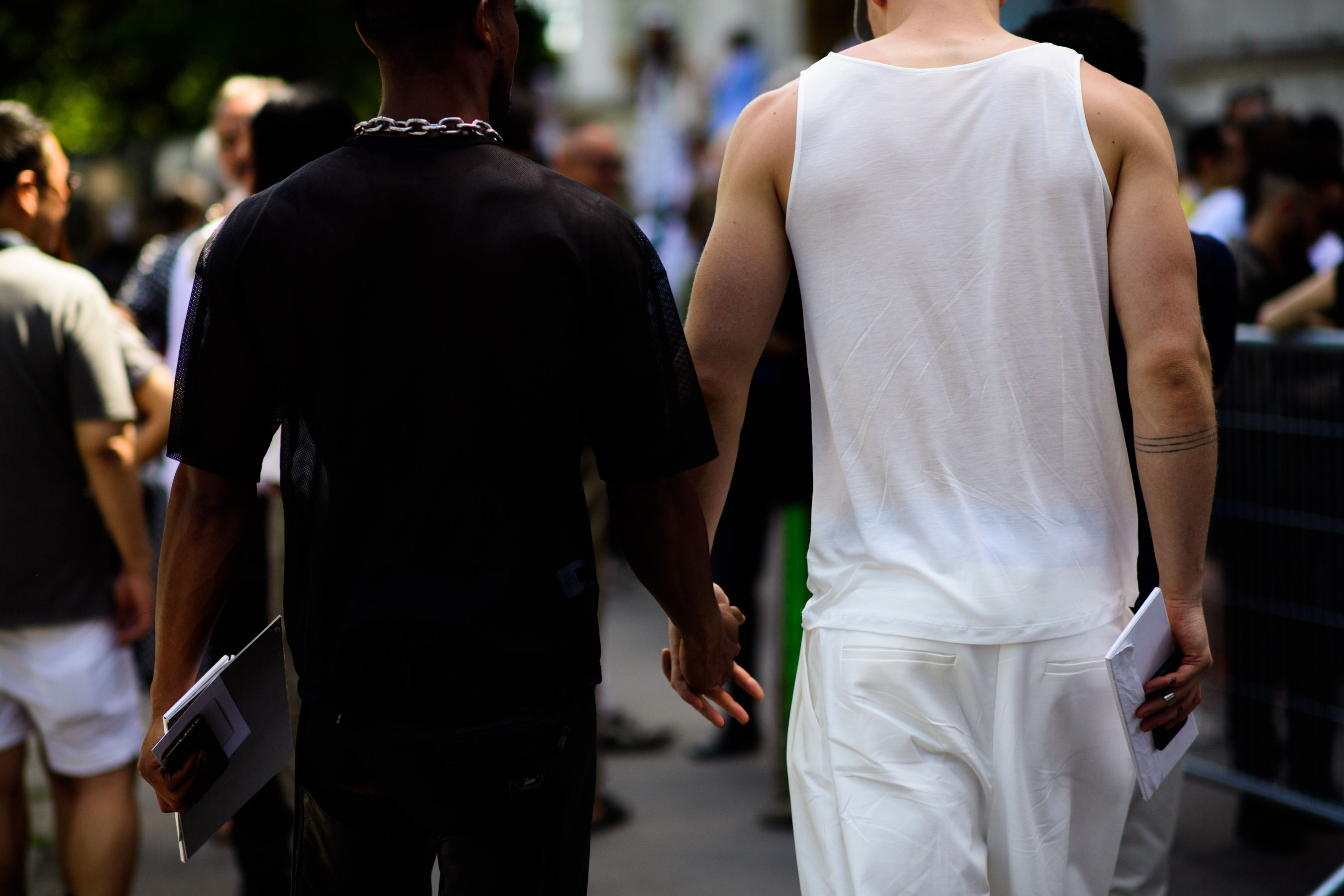 Men wearing black and white outfits