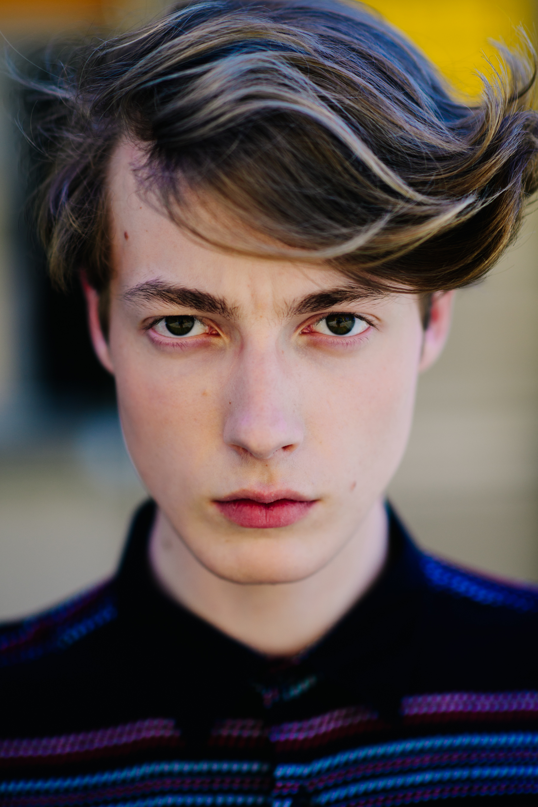 A young man with a strong look