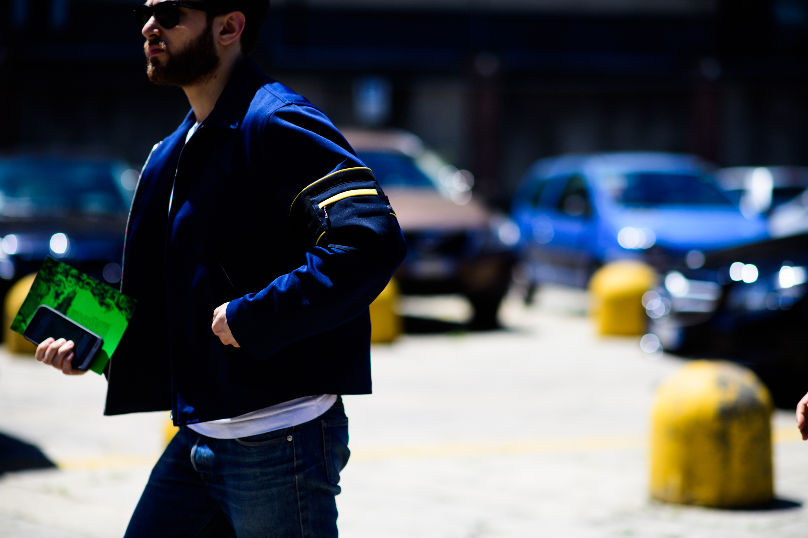 A man wearing a blue jacket