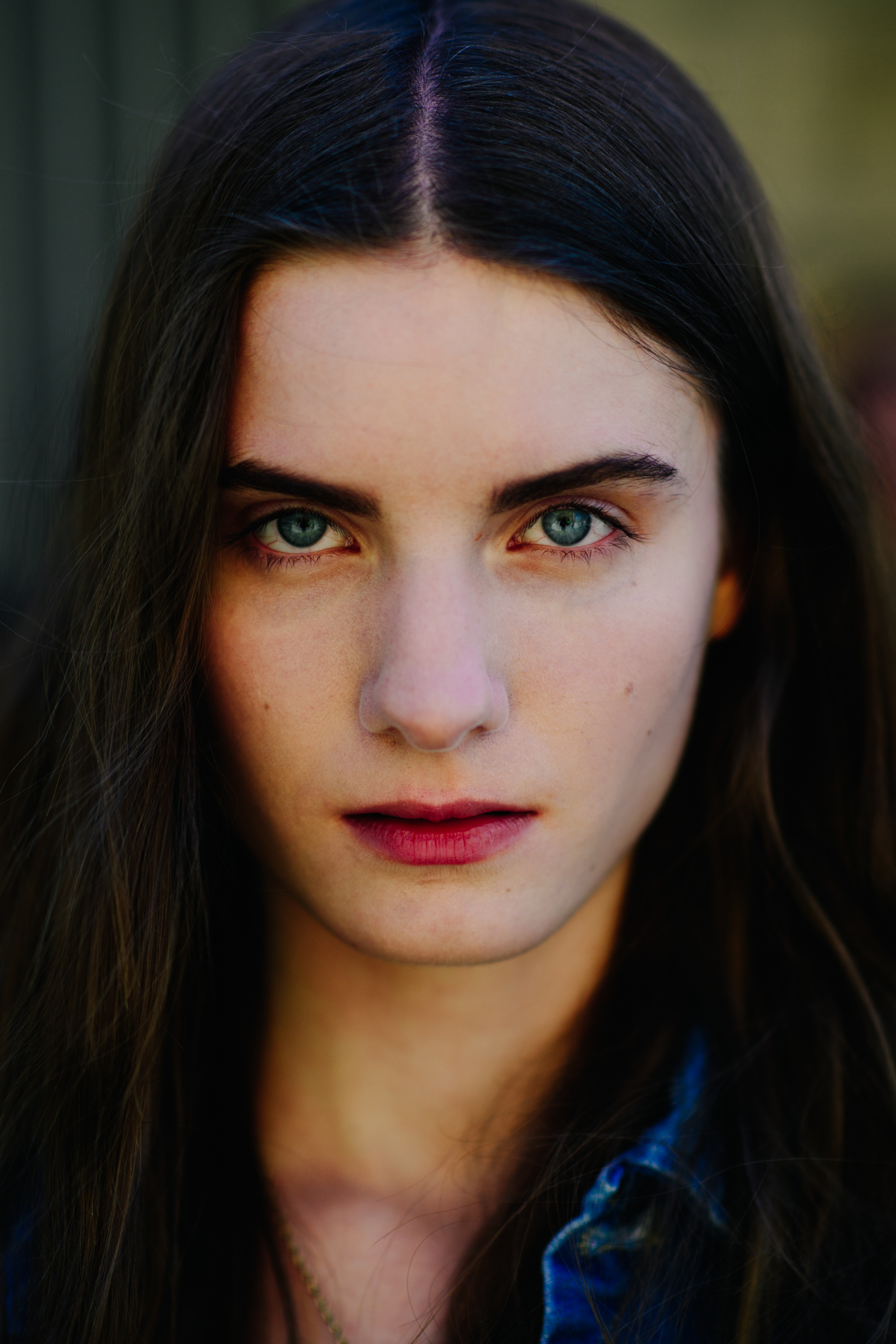 A girl with bright green eyes
